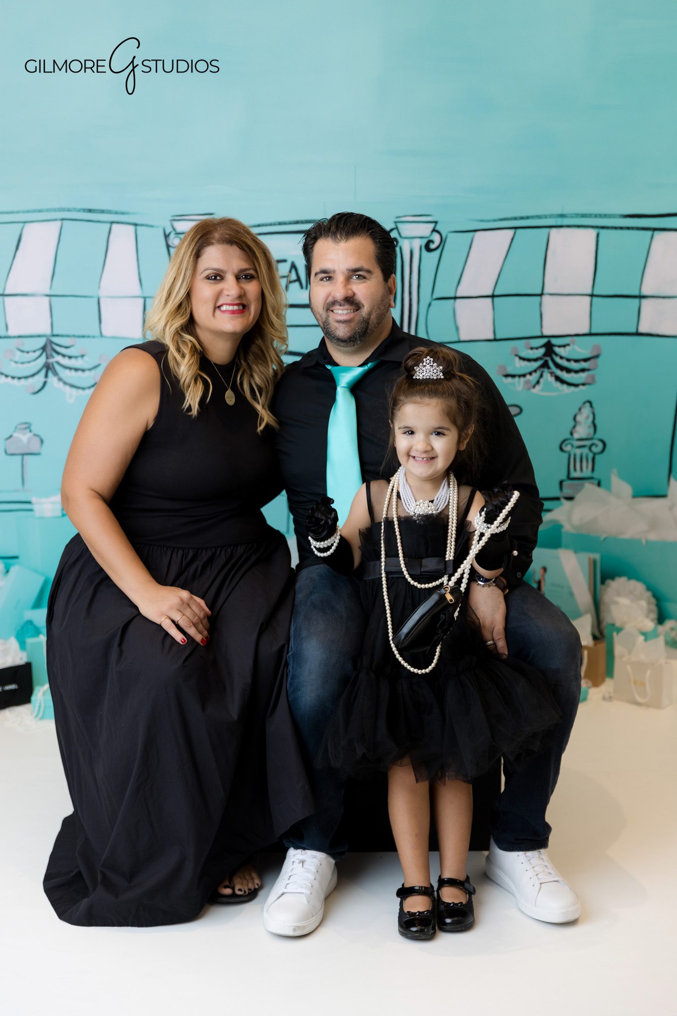 Cake smash style photo for Tiffany theme 3rd birthday session.
Tiffany theme birthday photographer capturing fancy birthday outfit.