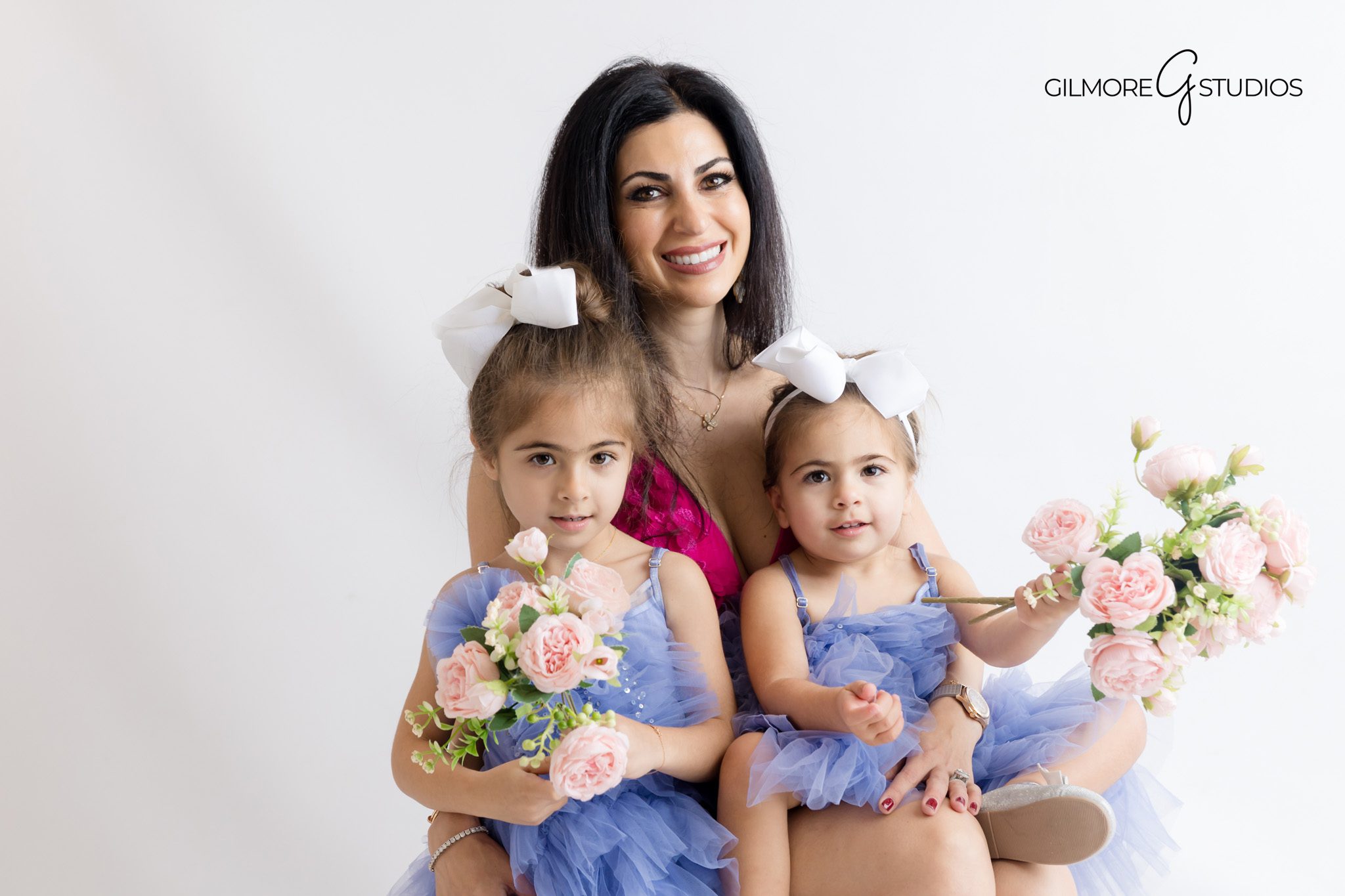 Snowflake prop photography for Frozen 5th birthday session.

Frozen style portrait session with soft white and blue tones.
