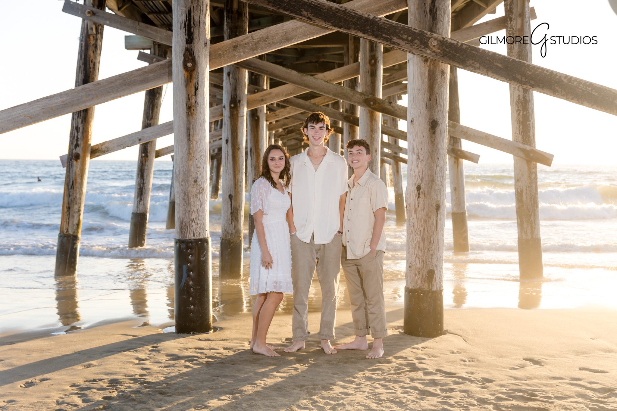 Family photography capturing warm glow of sunset at Newport Beach.
Newport Beach portrait photographer capturing soft evening tones.