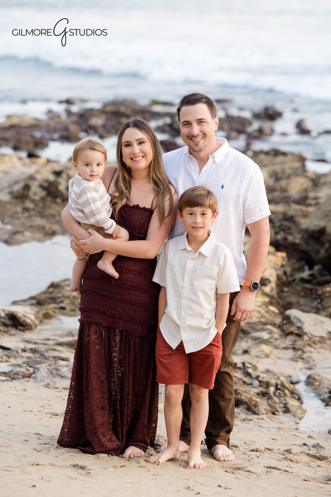 Newport Beach family mini session photography with candid lifestyle moments.

Professional family photographer capturing hugs and laughter at Little Corona Beach.
