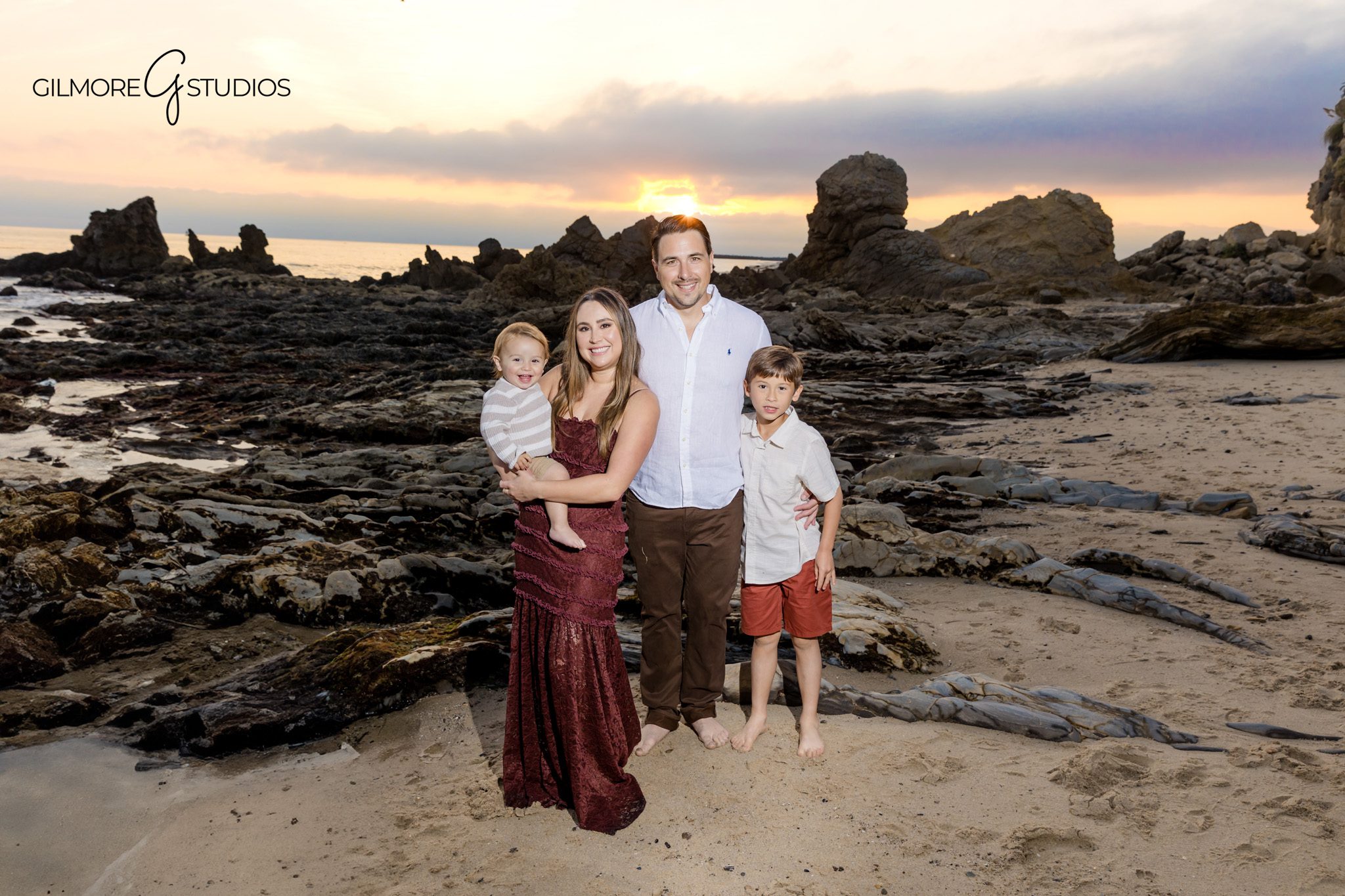 Family mini session photographer capturing movement and emotion at Little Corona.

Orange County family photography with neutral outfits at Little Corona Beach.