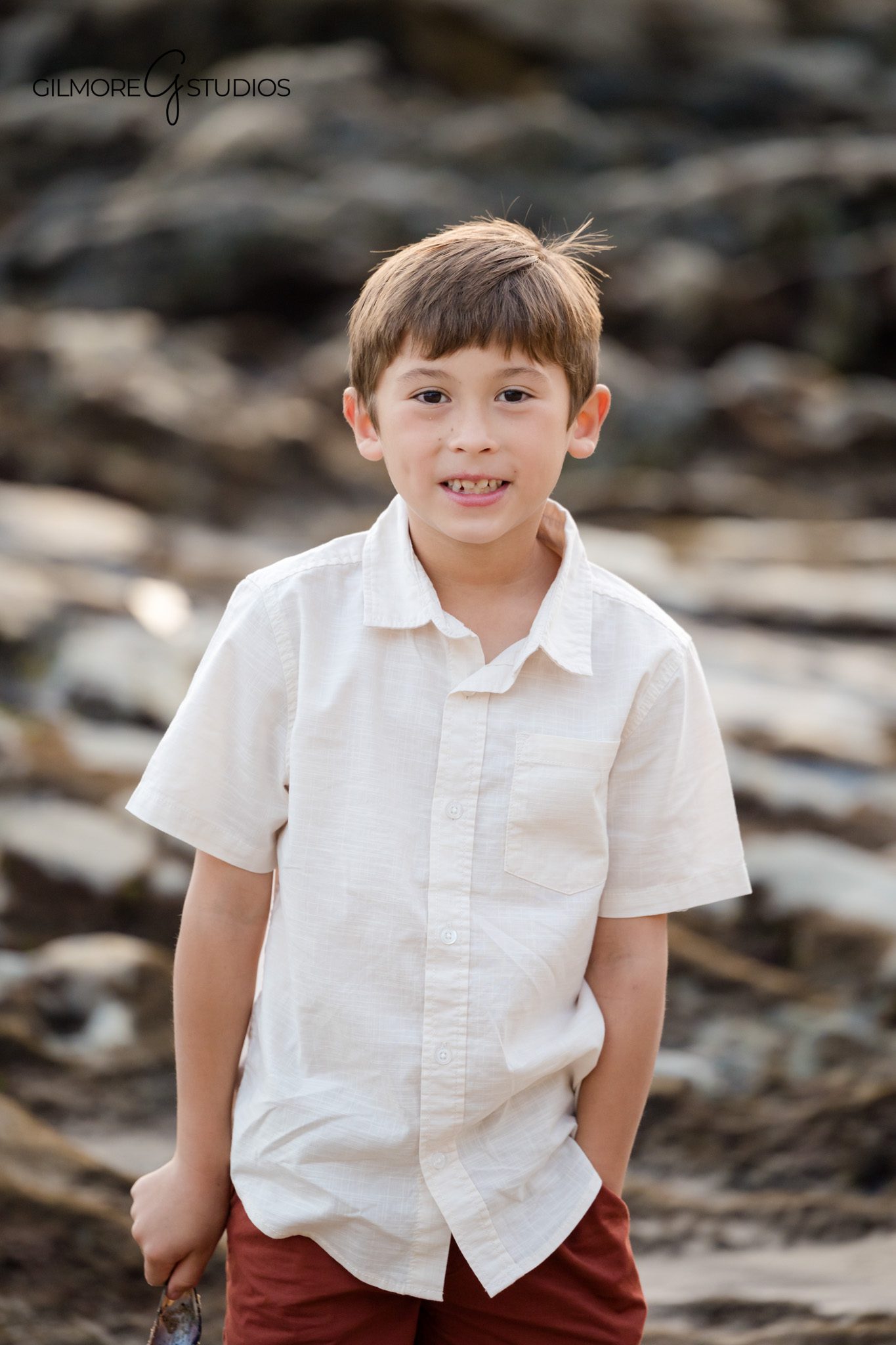 Newport Beach family photography featuring candid walking portraits by the water.

Family portrait photographer documenting joyful moments at Little Corona Beach.