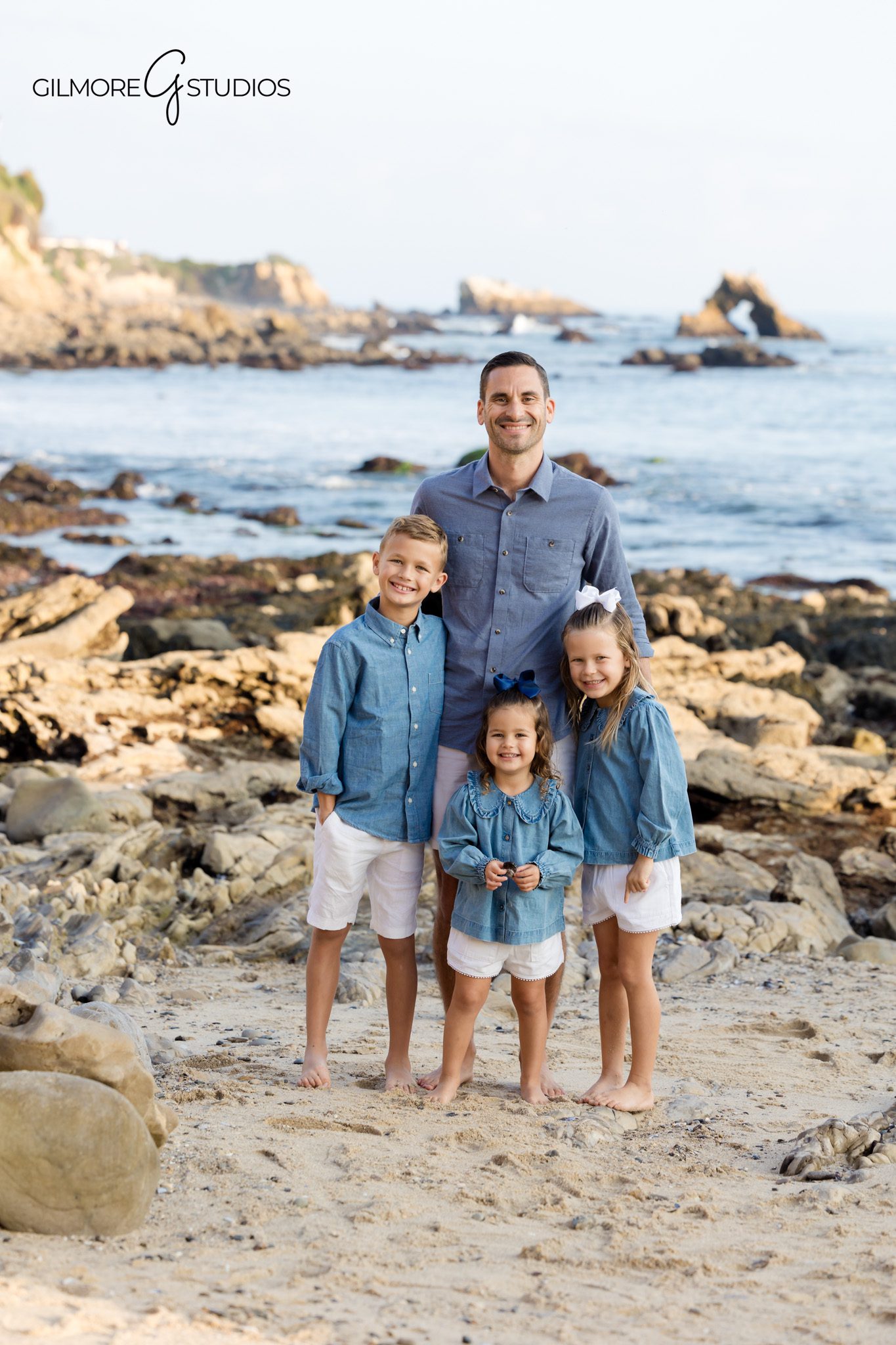 Little Corona sunset family mini session photography

Family portraits during golden hour at Newport Beach photographer