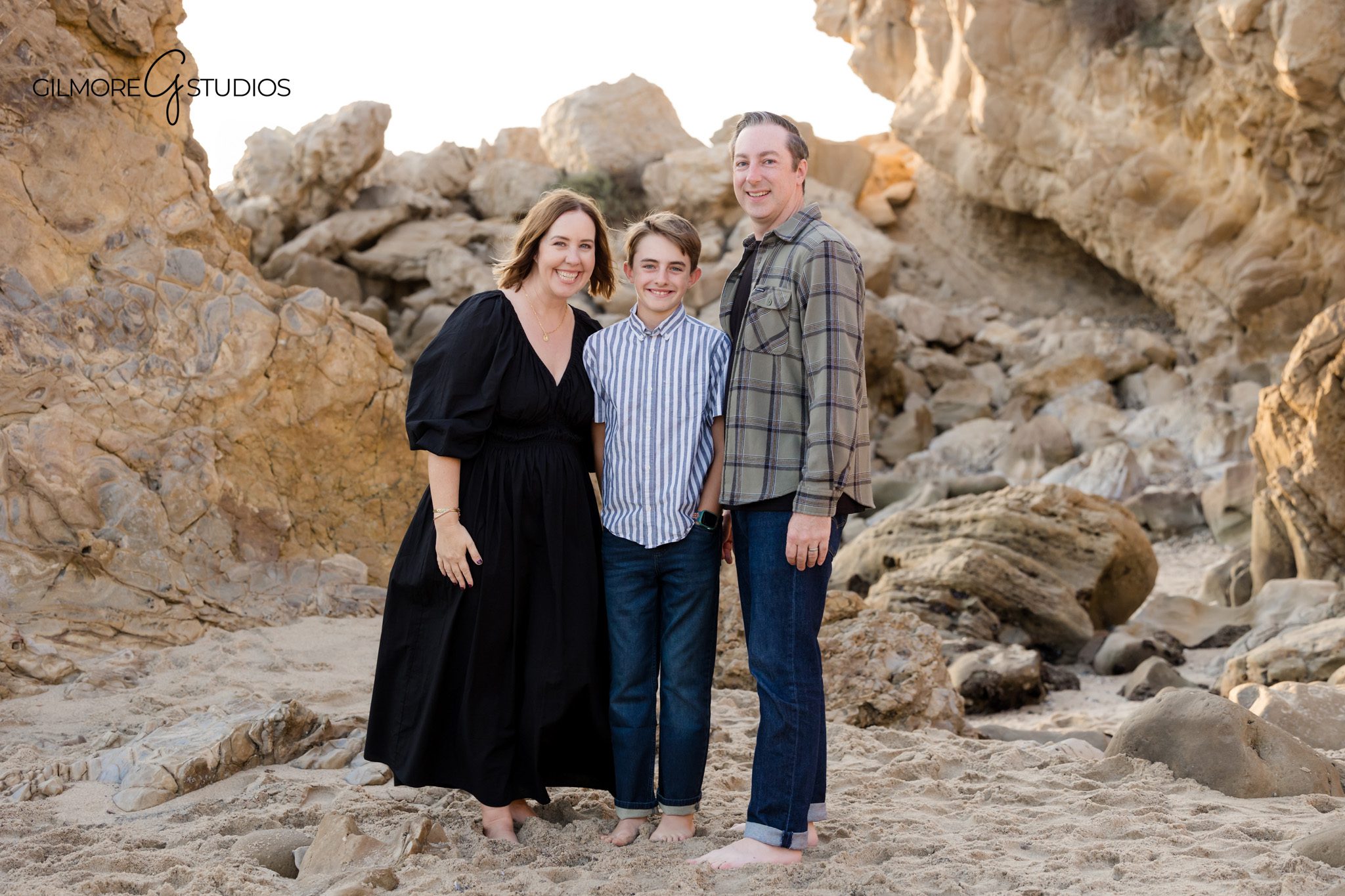 Corona del Mar family portrait photography session with natural posing

Family beach mini session at Little Corona CDM with parents holding hands photographed by a professional photographer