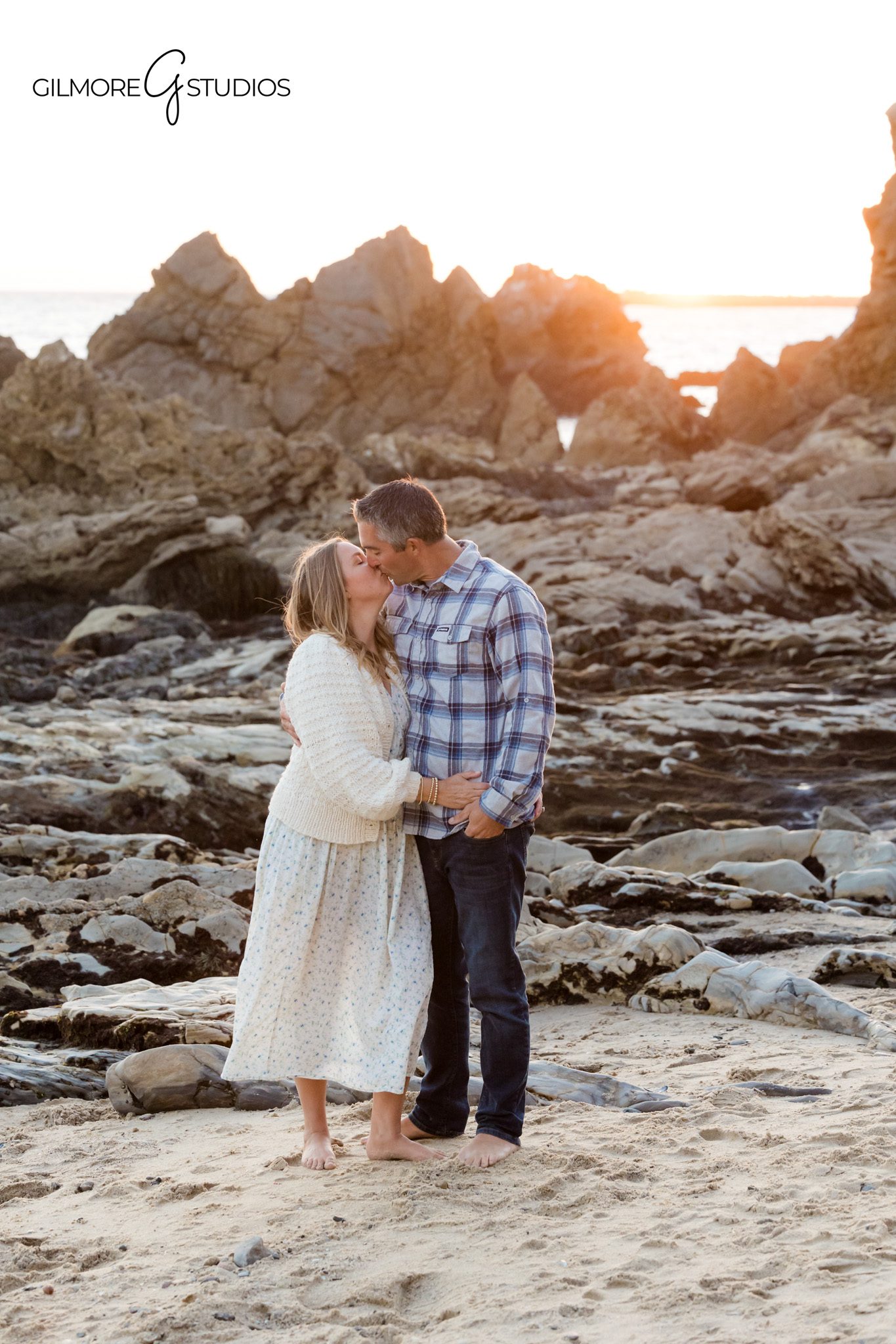 Corona del Mar family portrait photography with soft neutral tones

Little Corona Beach family photos captured by Gilmore Studios photographer
