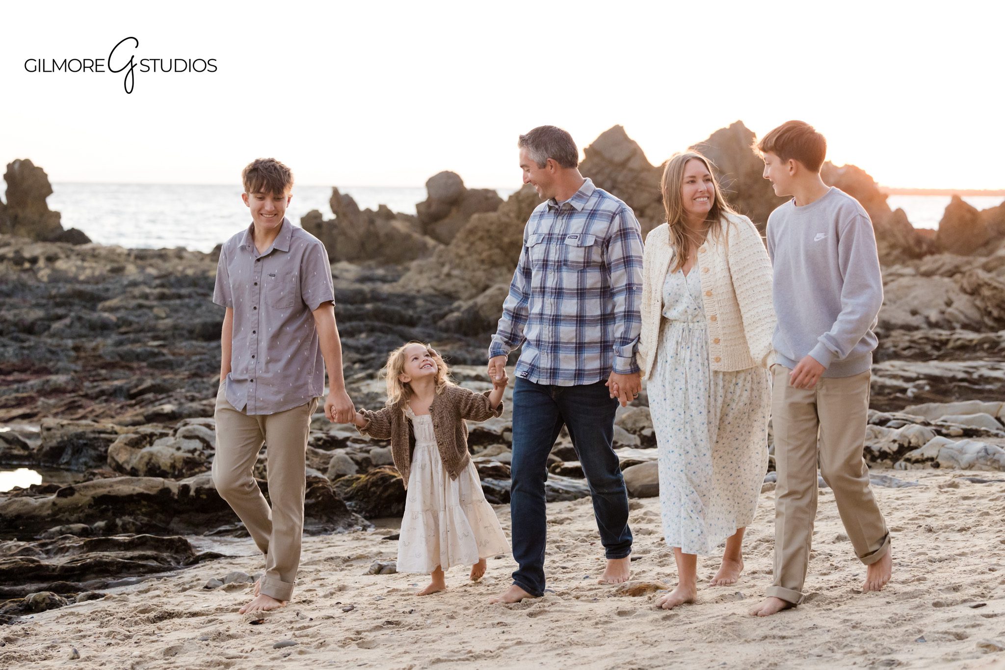 Family photography Little Corona Beach with ocean breeze and natural tones

Corona del Mar family photographer capturing relaxed beach portraits