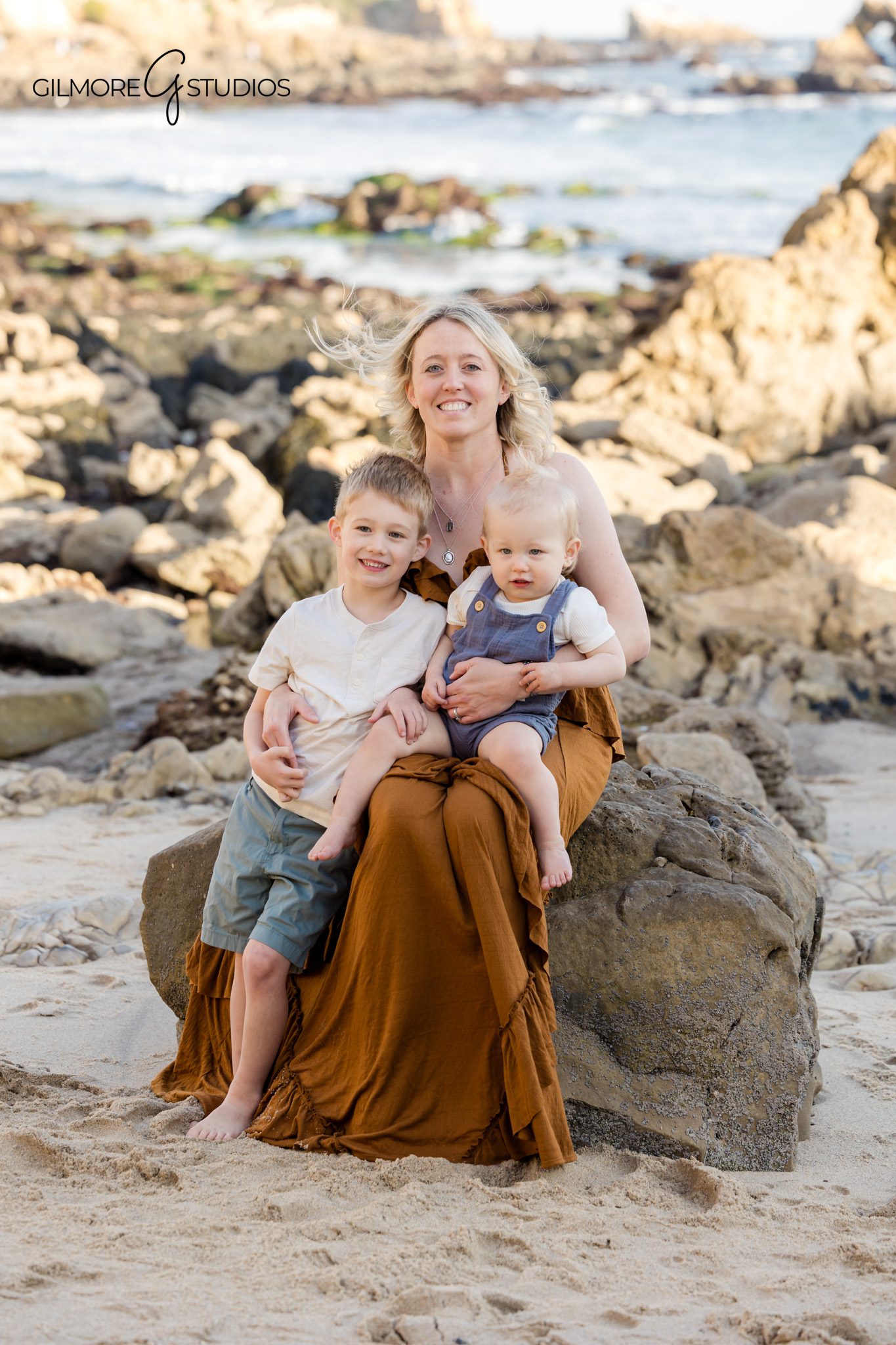 Family portrait photography at Little Corona Beach in Newport Beach during golden hour

Little Corona Beach family photography session with children playing near tide pools