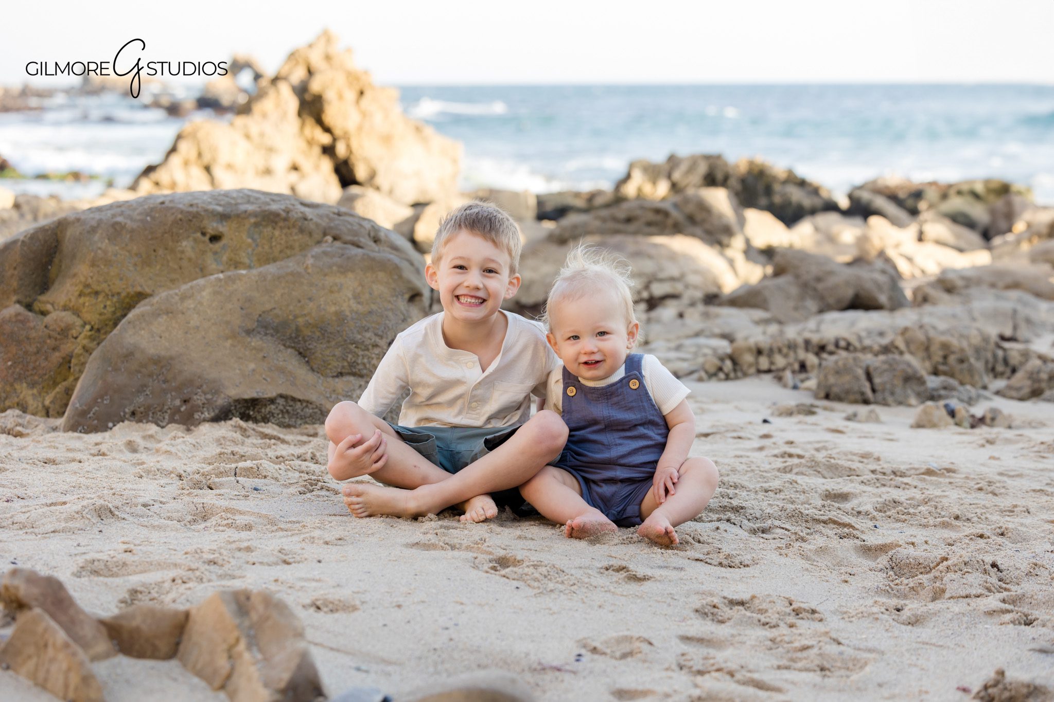 Little Corona Beach family portrait session with neutral outfits and coastal scenery

Beach family photography at Little Corona Beach in Newport Beach with soft natural light