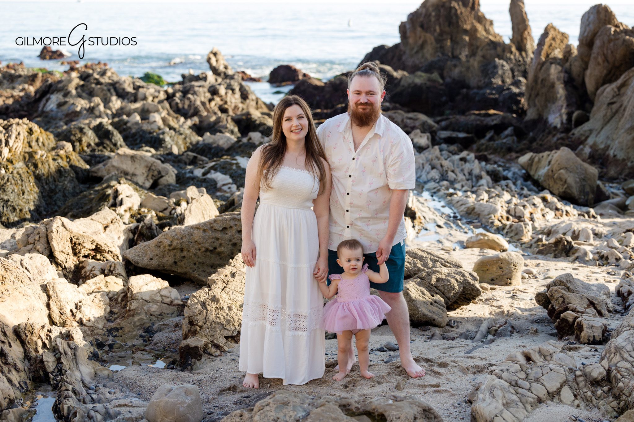Little Corona Beach family mini photography with organic movement

Family portrait photography Corona del Mar beach mini session