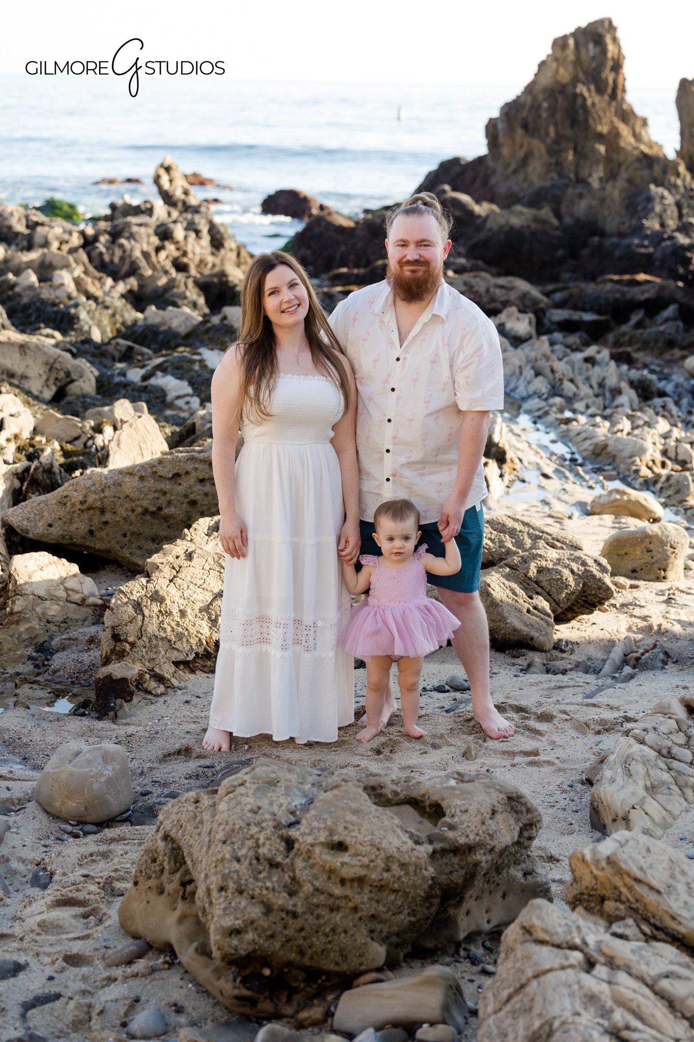 Little Corona Beach family mini portrait session with rocky cliffs and shoreline

Quick family photoshoot at Little Corona Beach photographed professionally