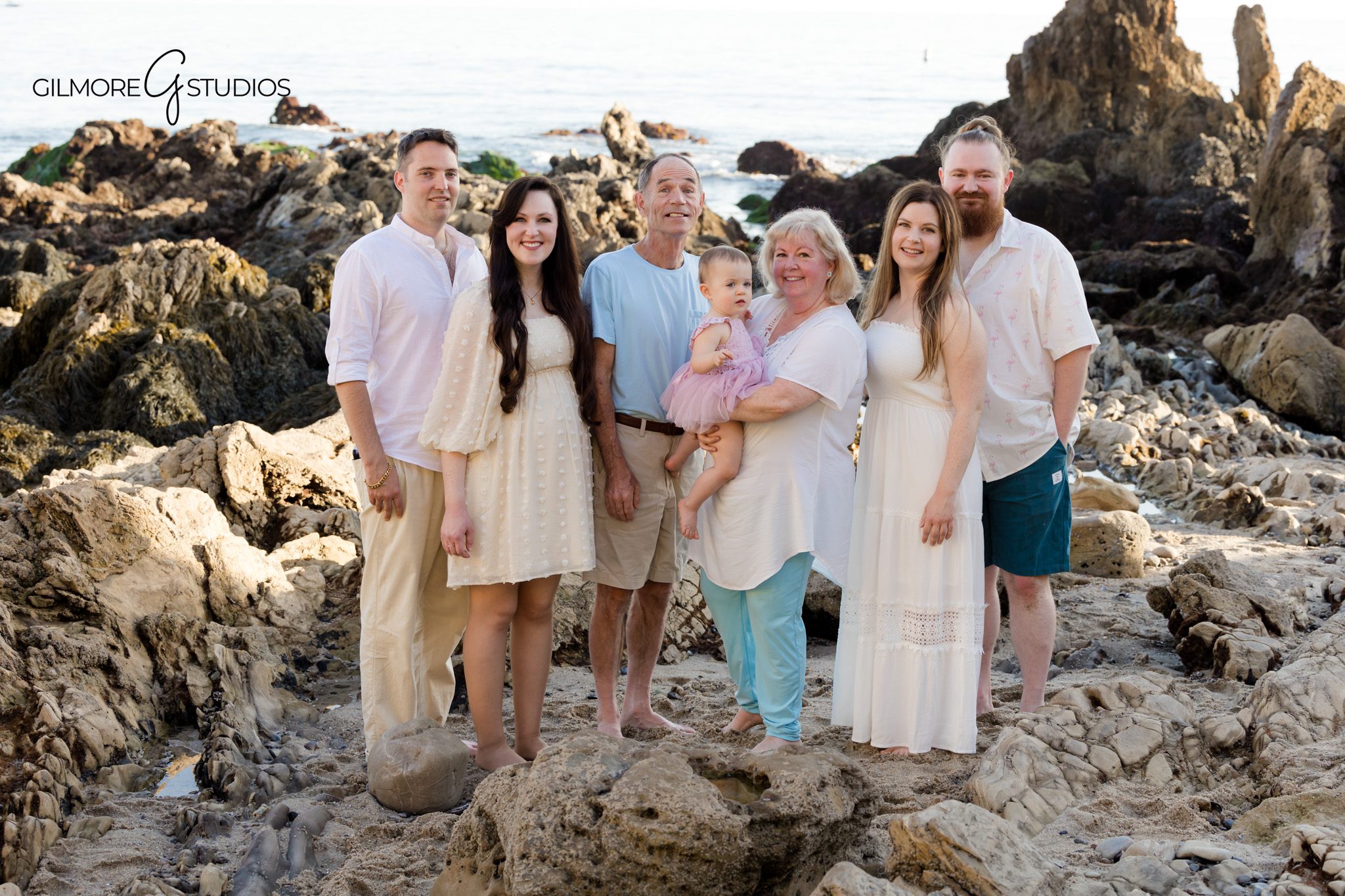 Corona del Mar family photographer photographing parents and children together

Little Corona Beach family mini portrait photography with timeless style