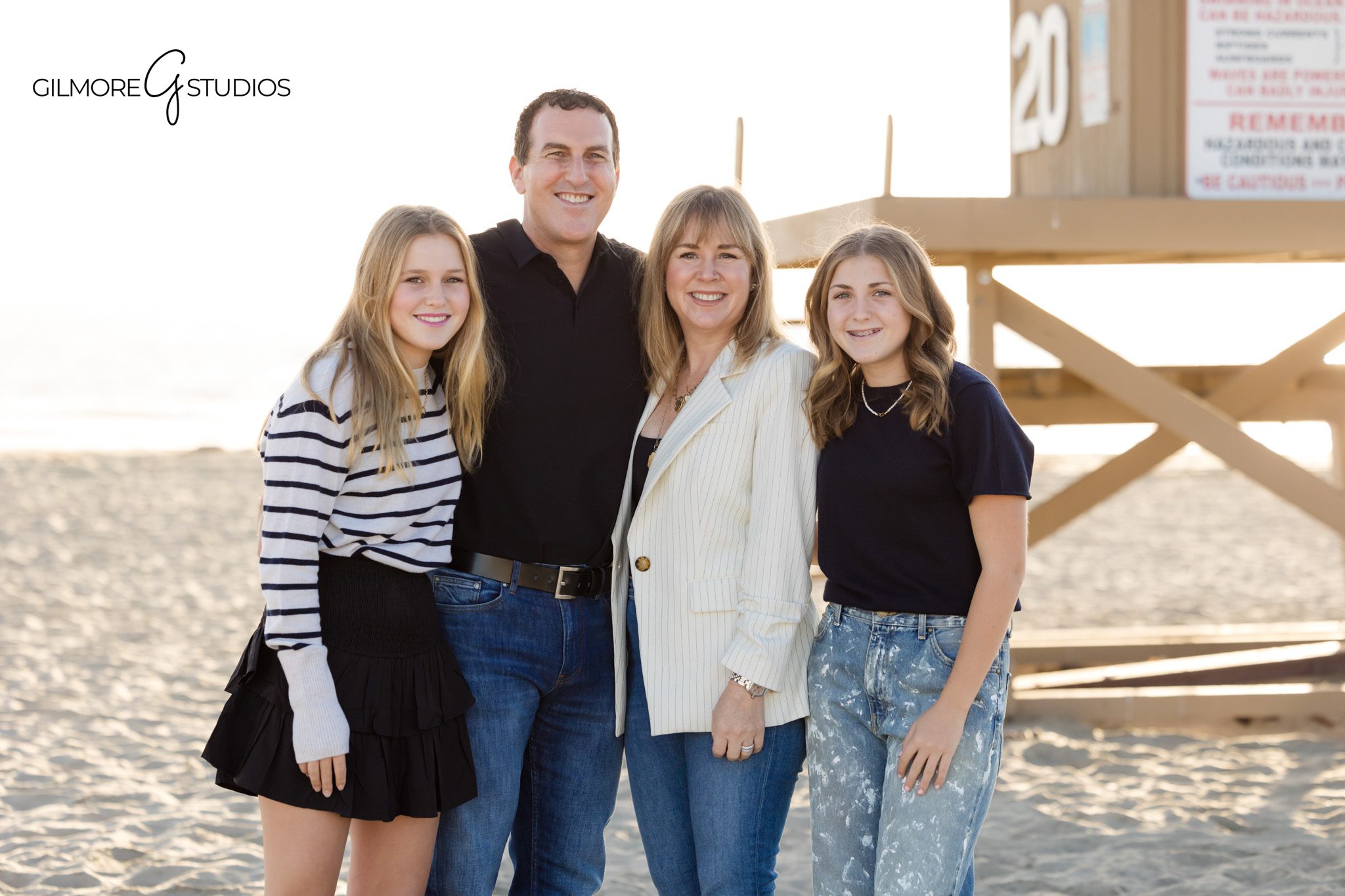 Beach family portrait featuring teen girls photographed at Newport Pier
Teen family photography session with coastal scenery at Newport Pier