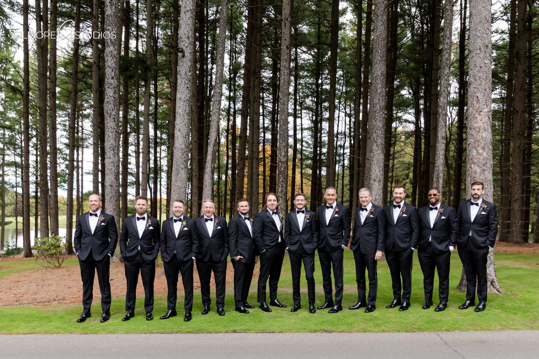 Wedding photographer capturing reception dance floor at Shepherds Hollow.

Romantic photography of couple embracing under tall pines.