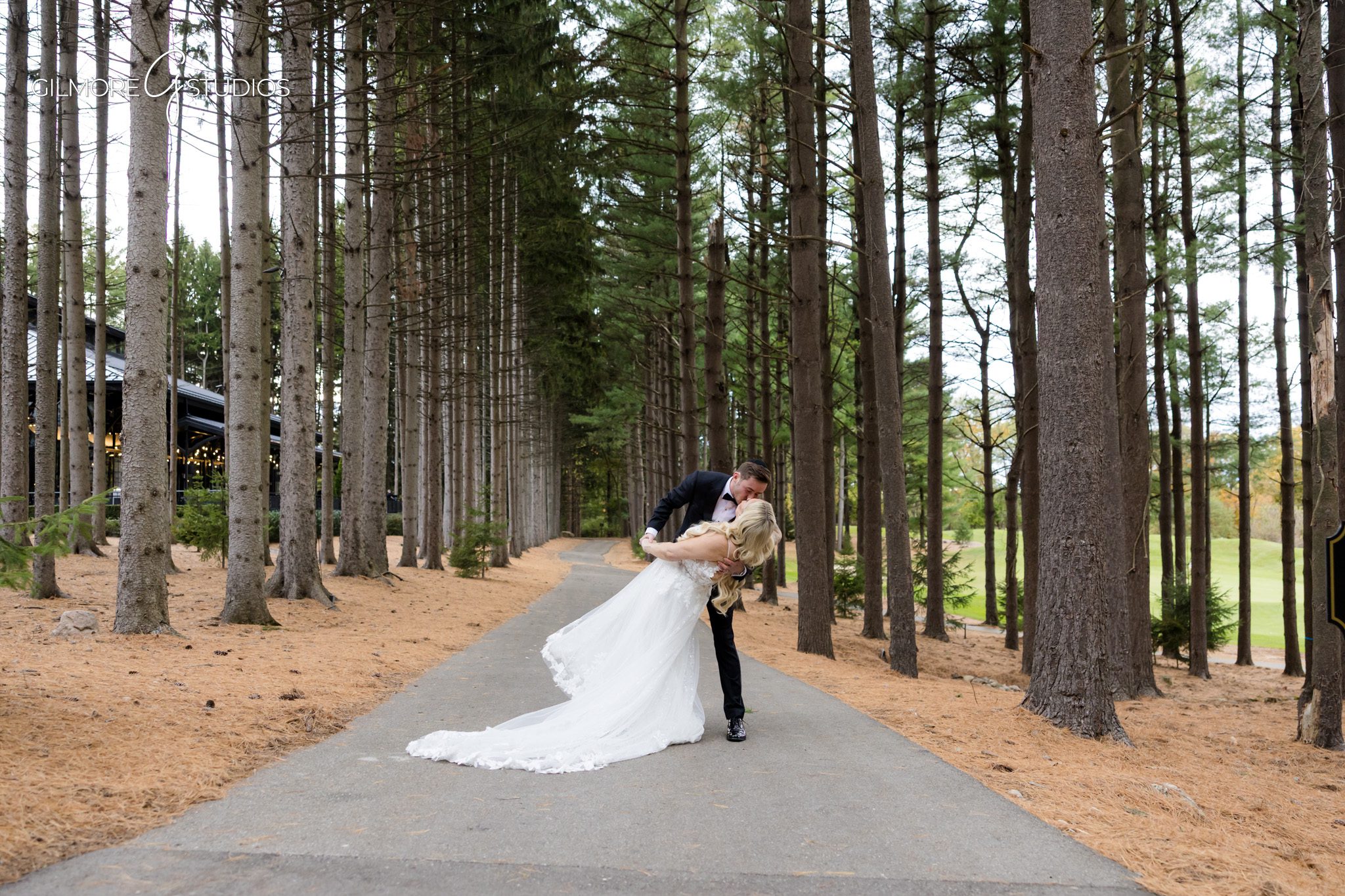 Candid wedding moment captured on Shepherds Hollow balcony.

Michigan photographer capturing bride holding bouquet.