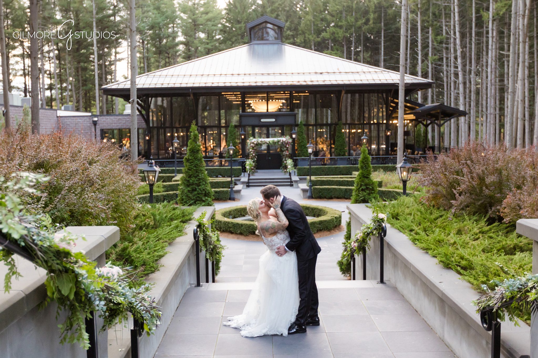 Elegant wedding portrait photographed on Shepherds Hollow forest path.

Bride walking through pine trees photographed by Michigan wedding photographer.