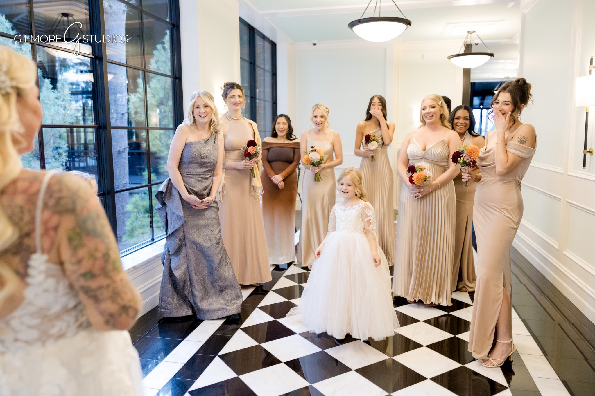 Bridal portrait photography with soft natural lighting in wooded area.

Michigan photographer capturing wedding party on golf course greens.