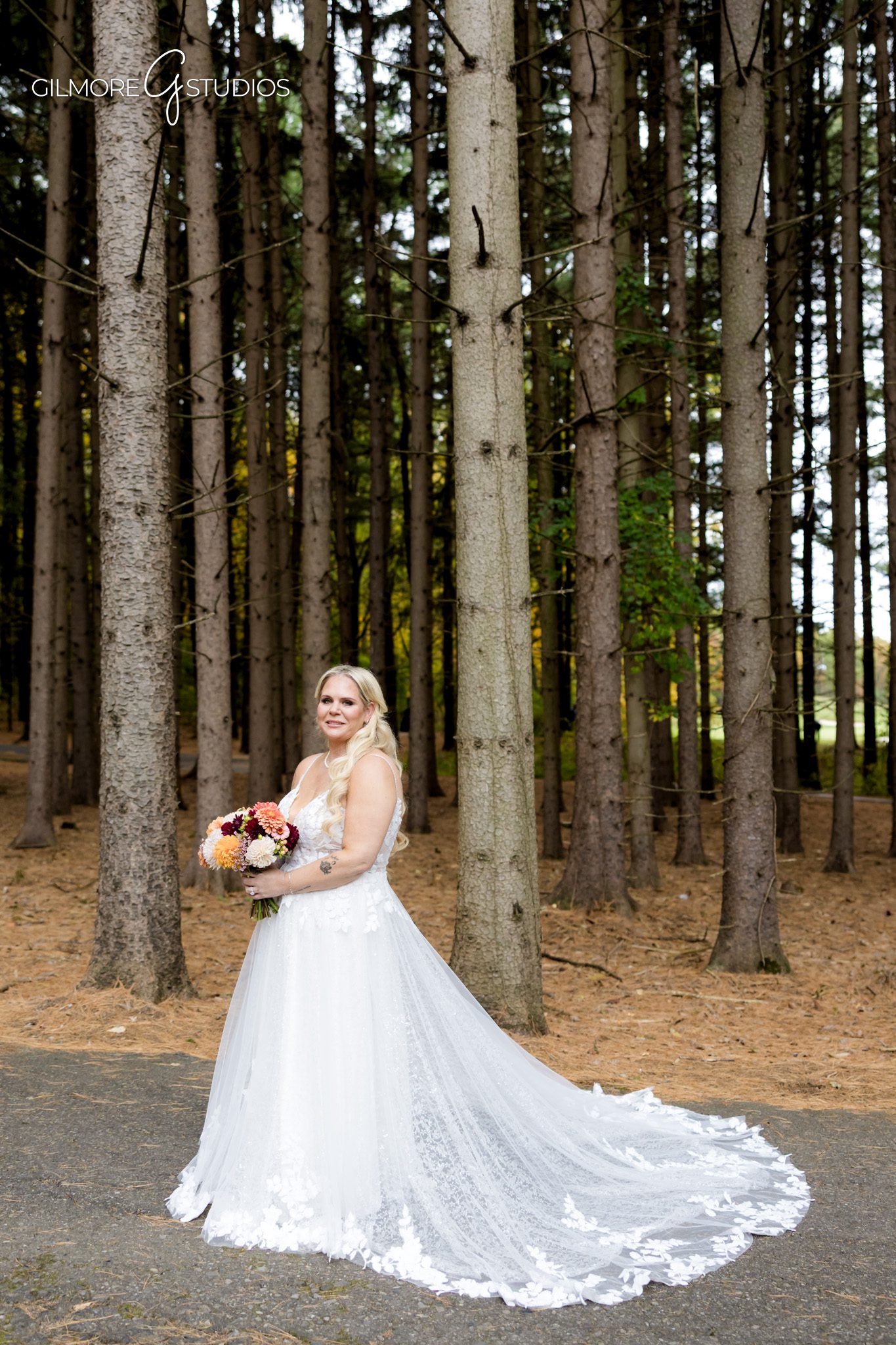 Michigan venue photography highlighting Shepherd’s Hollow entrance.

Editorial wedding photographer capturing wide forest landscape.