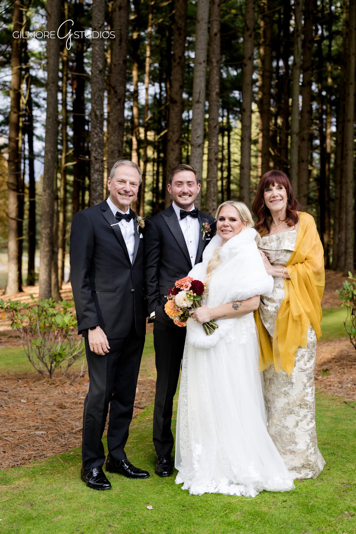 Groom smiling during candid wedding moment in forest.

Reception photography capturing speeches and reactions.