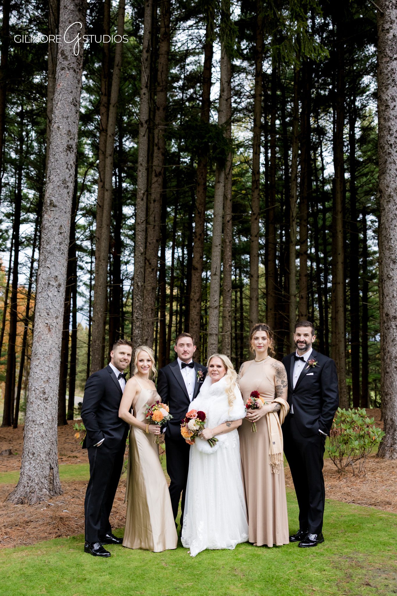 Romantic portrait photography with bride resting on groom’s shoulder.

Bride standing on pathway photographed in soft natural light.