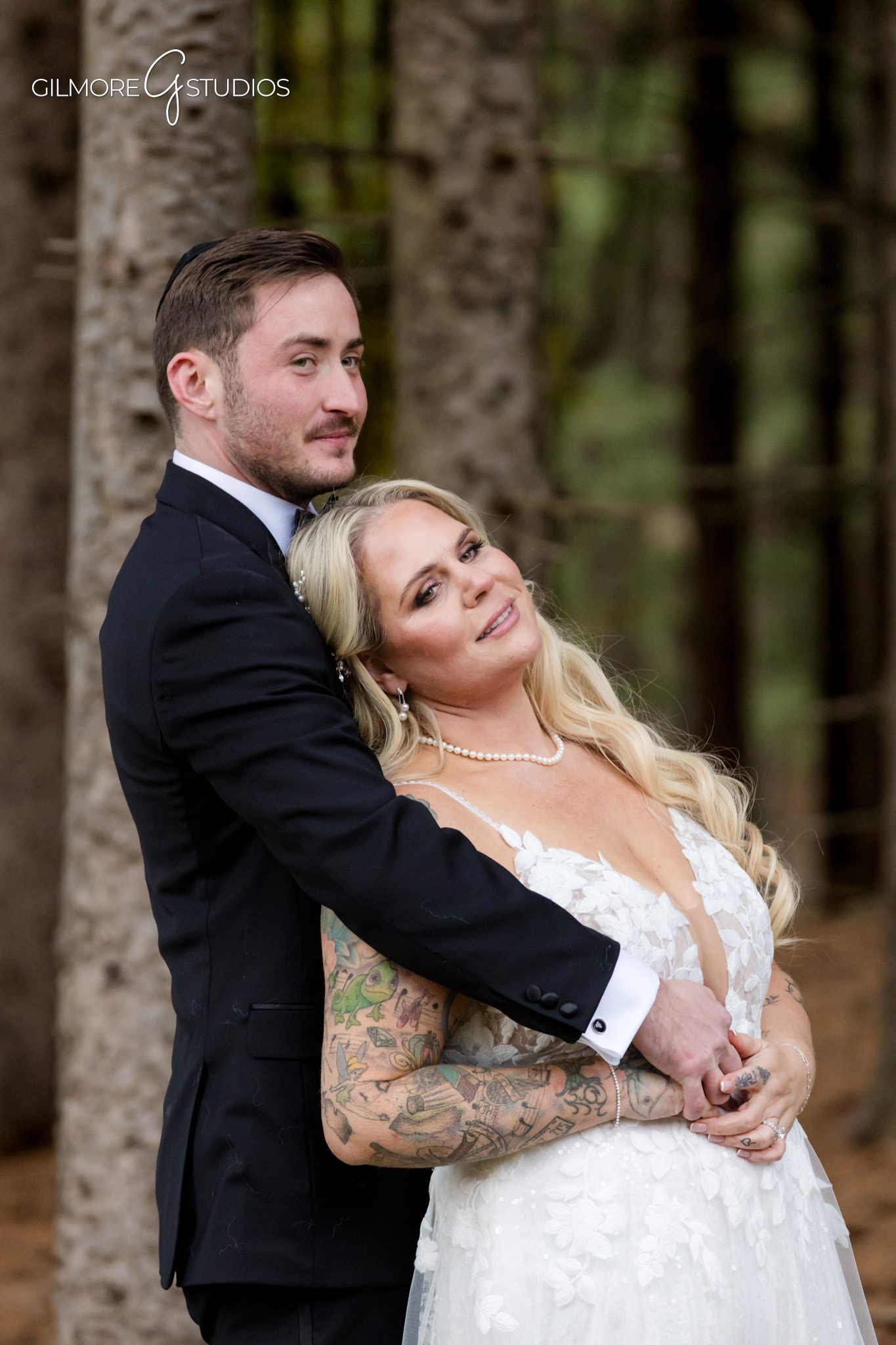 Bridal portrait in indoor window light at wedding venue.

Ceremony photography capturing guests seated outdoors.