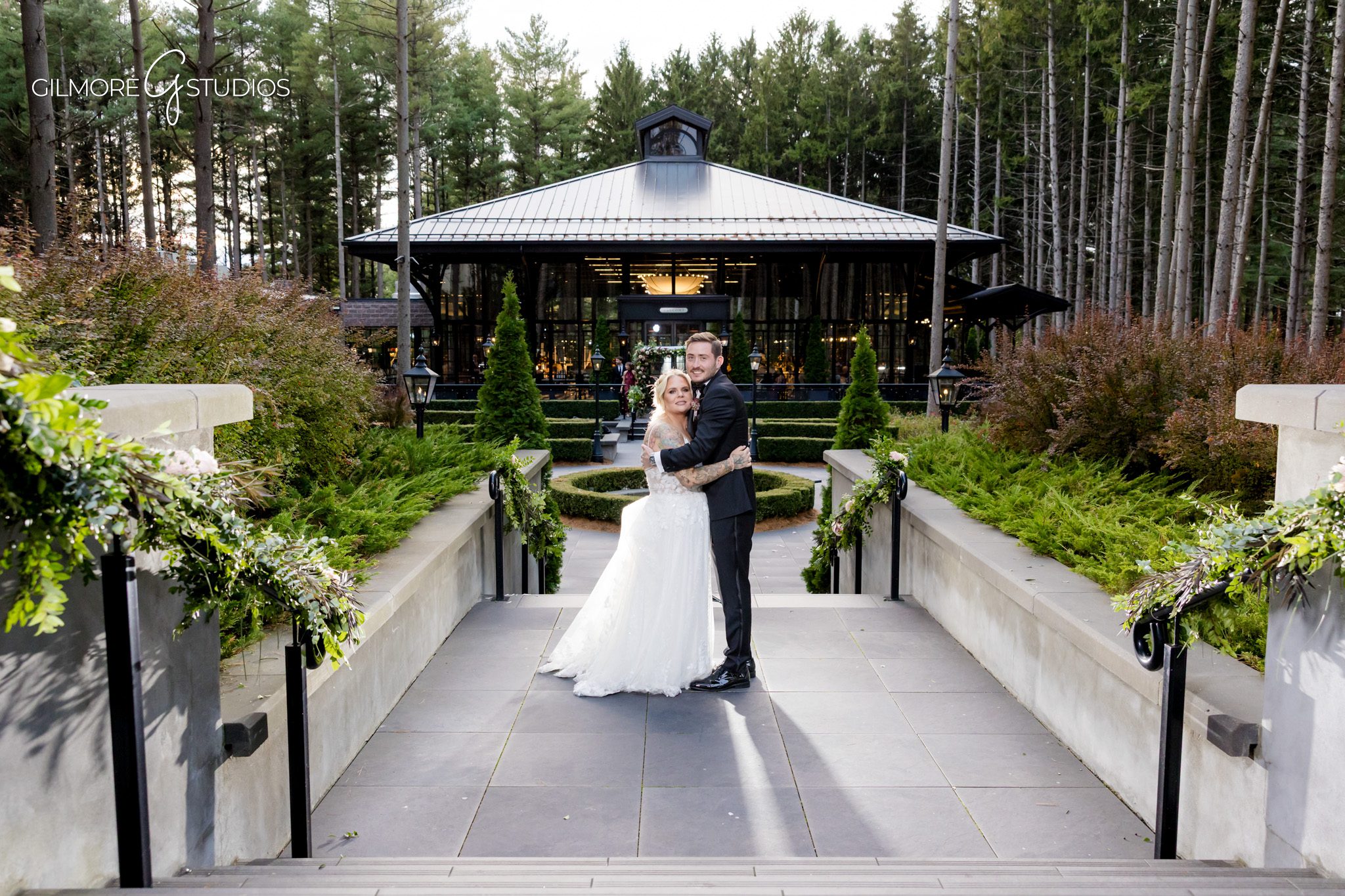 Wedding photographer capturing emotional vows at Michigan forest venue.

Romantic couple photography by Shepherd’s Hollow reflective ponds.