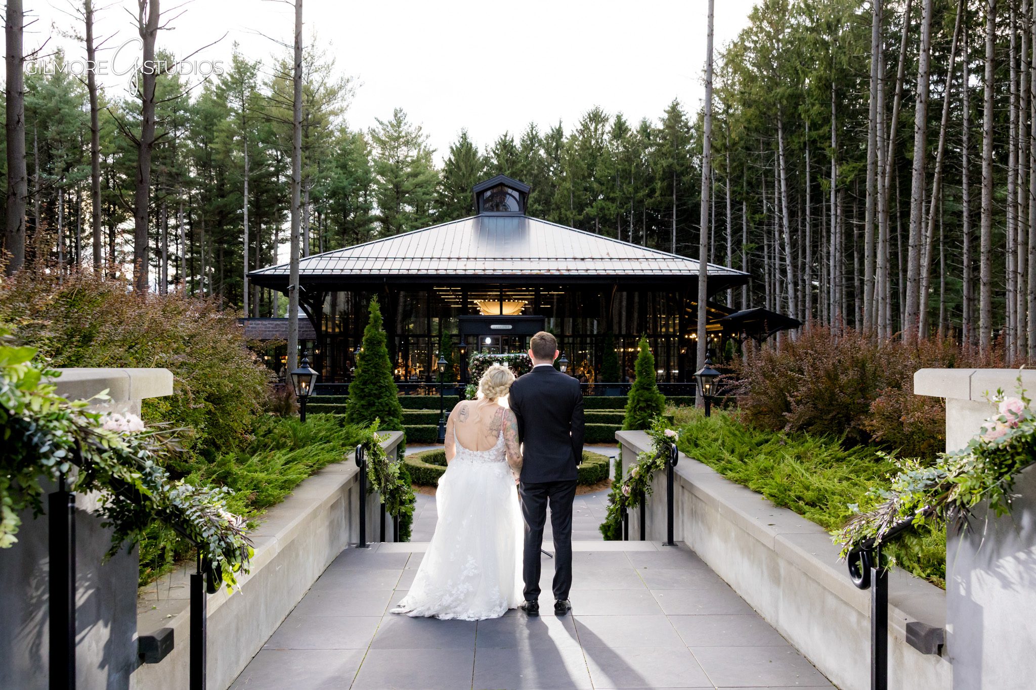 Bridal portrait photography with soft natural lighting in wooded area.

Michigan photographer capturing wedding party on golf course greens.