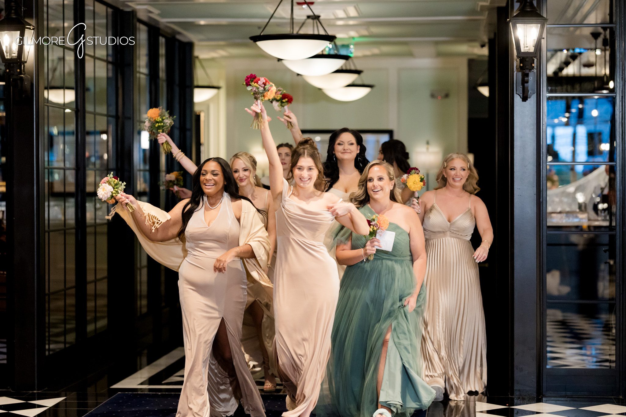 Ceremony photography showing couple exchanging rings beneath tall pines.

Michigan wedding portrait session featuring romantic forest setting.