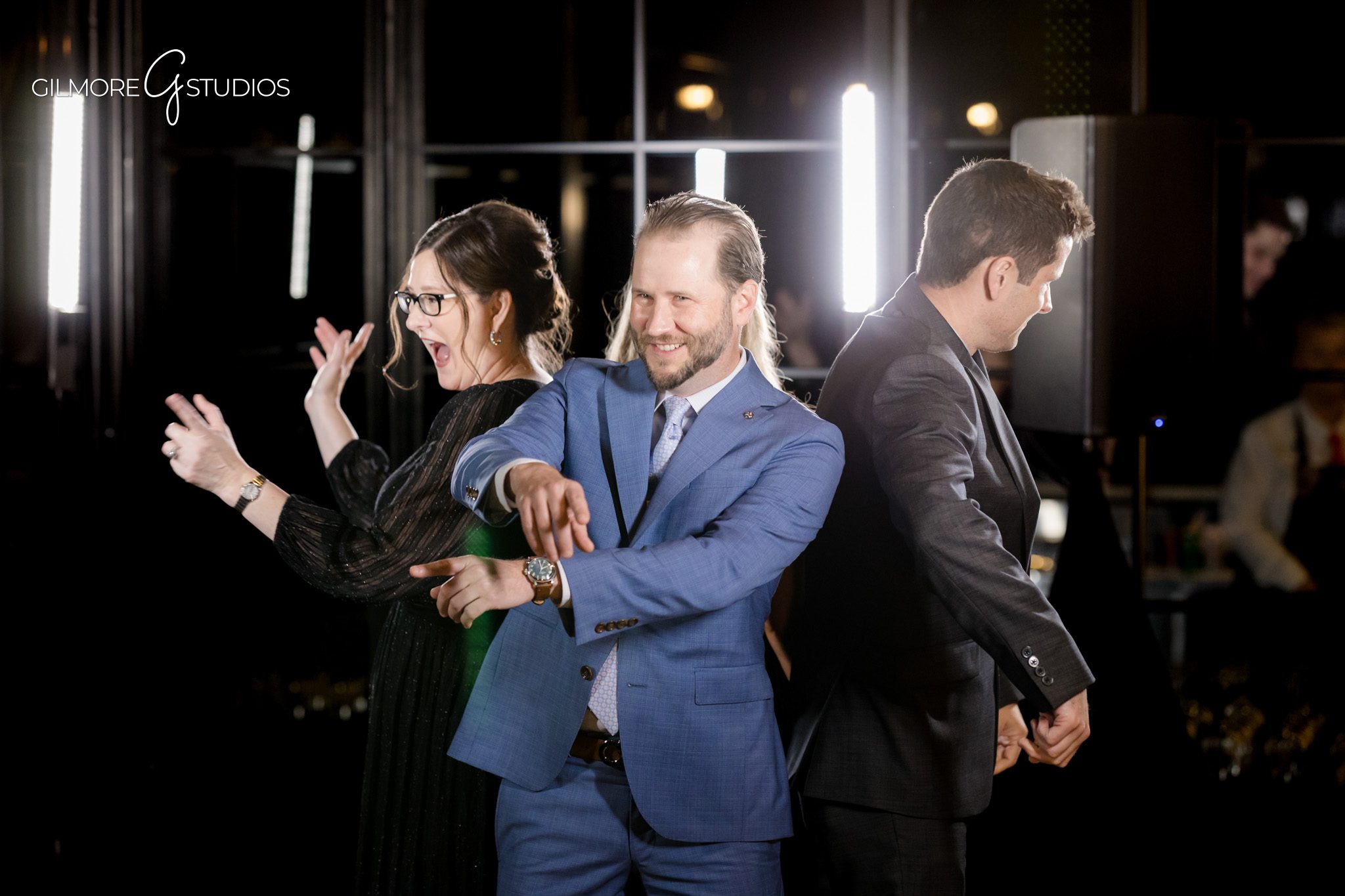 Michigan wedding photography showcasing lush green surroundings.

Bride and groom portrait photography near wooden bridge at venue.