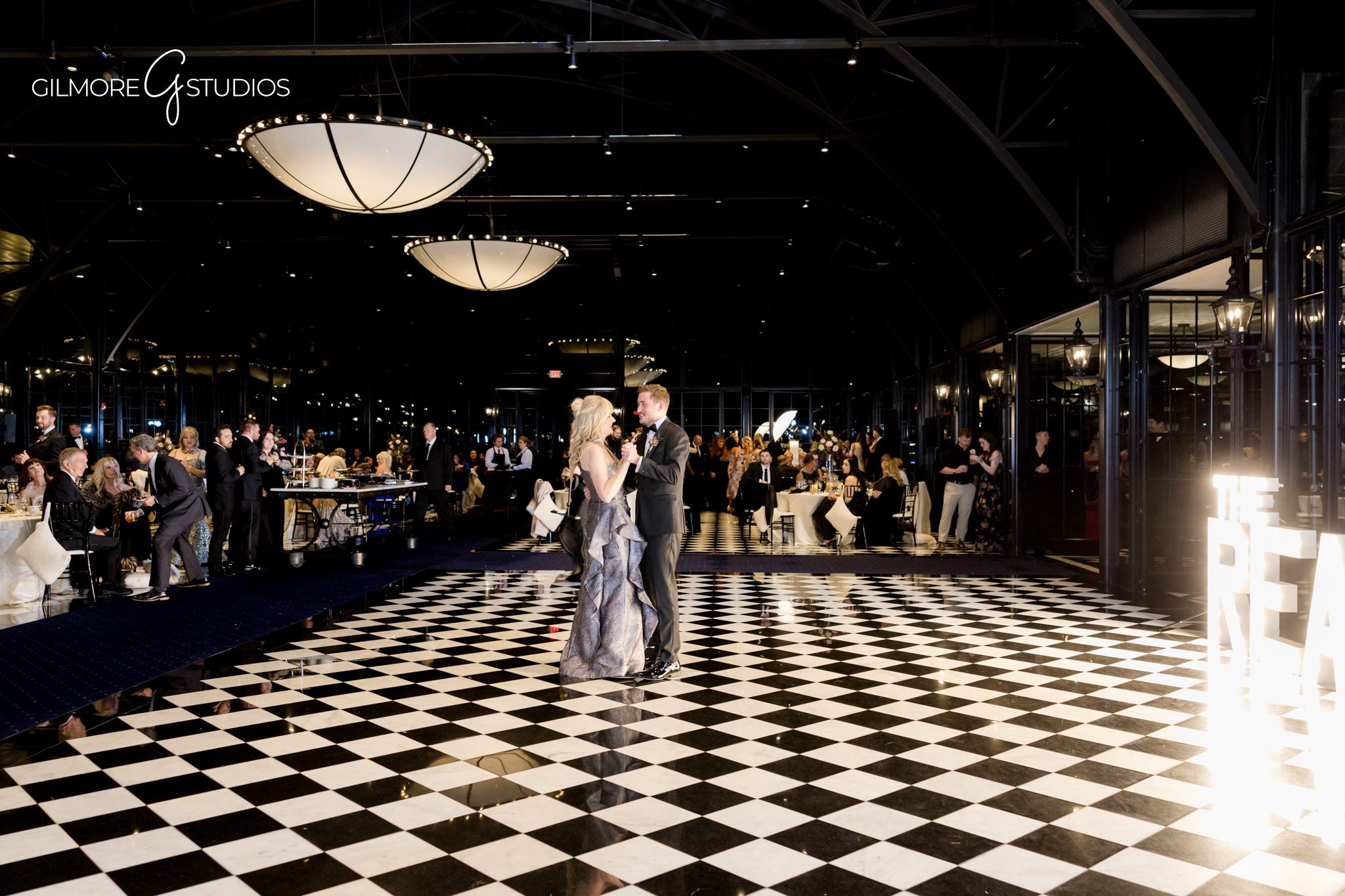 Bridal party portrait photography posed in tall pine forest.

Michigan destination photographer capturing timeless bridal elegance.