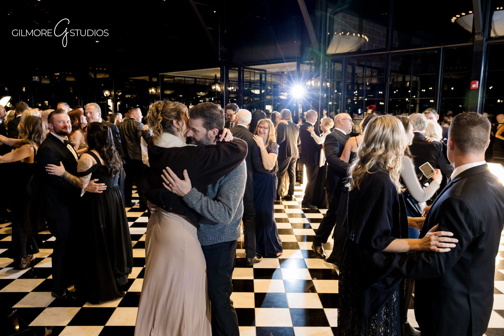 Wedding photographer capturing couple’s silhouette at dusk.

Bridal photography featuring veil flowing in Michigan breeze.