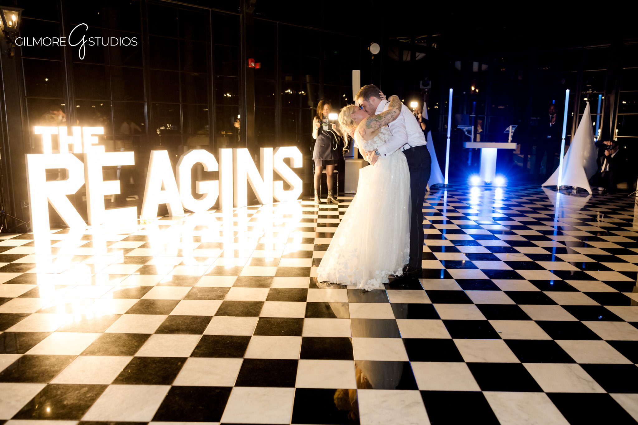Wedding photographer documenting cake cutting under soft lighting.

Michigan forest photography highlighting dramatic tree shadows.