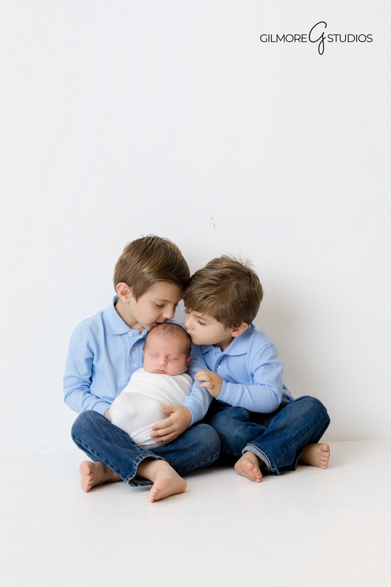 Professional baby photographer in Gilbert focusing on soft expressions.

Newborn photographer creating timeless portrait in neutral studio.