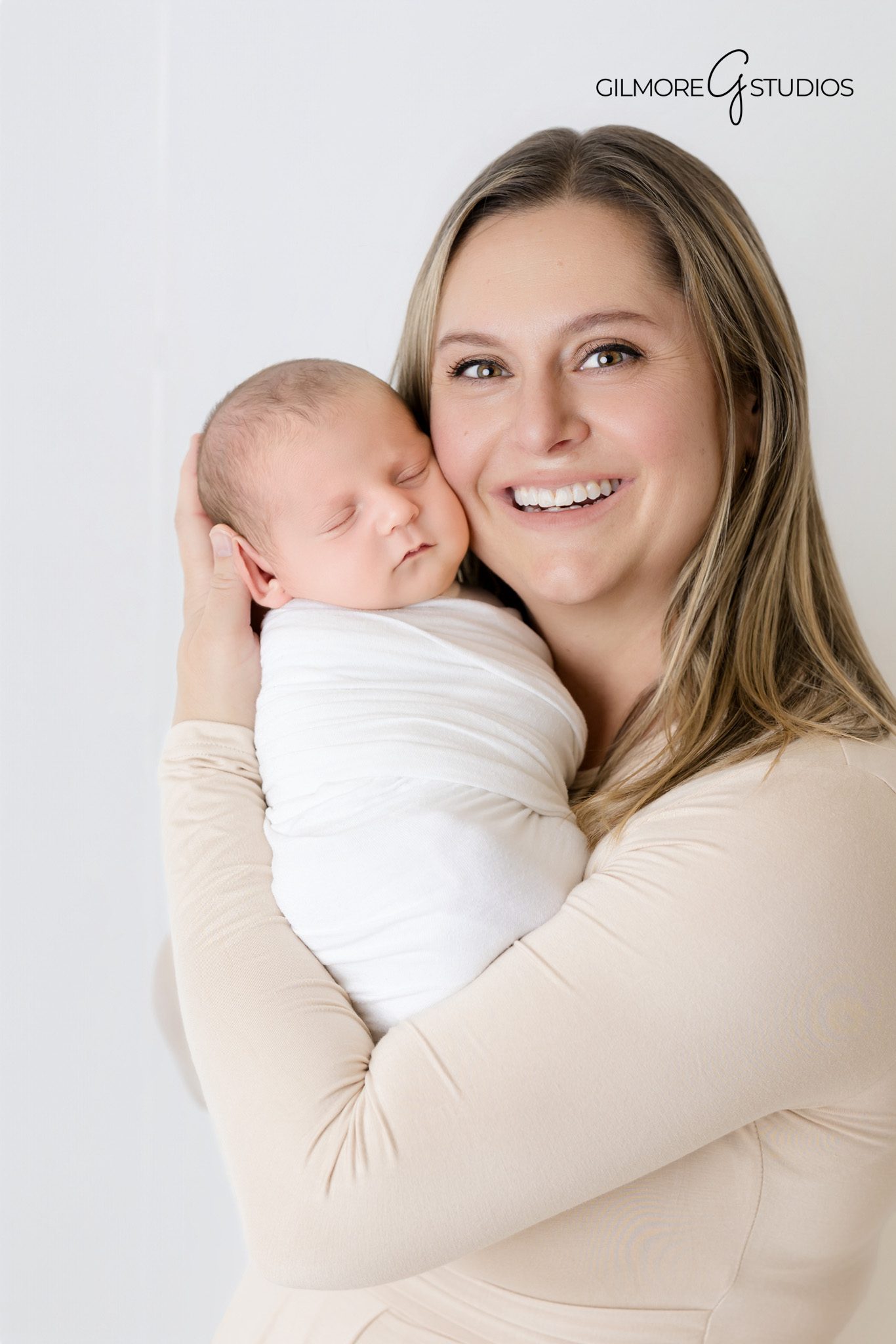 Baby portrait session in Gilbert studio with warm lighting.

Chandler newborn photography with gentle posing.