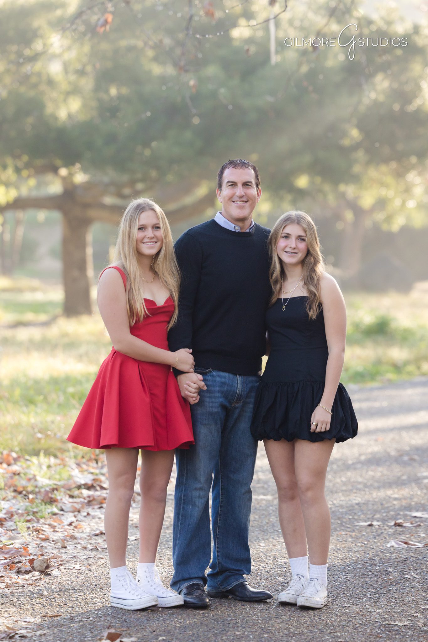 Newport Beach family photographer capturing parents and children walking together

Coastal family portrait photography in Newport Beach California