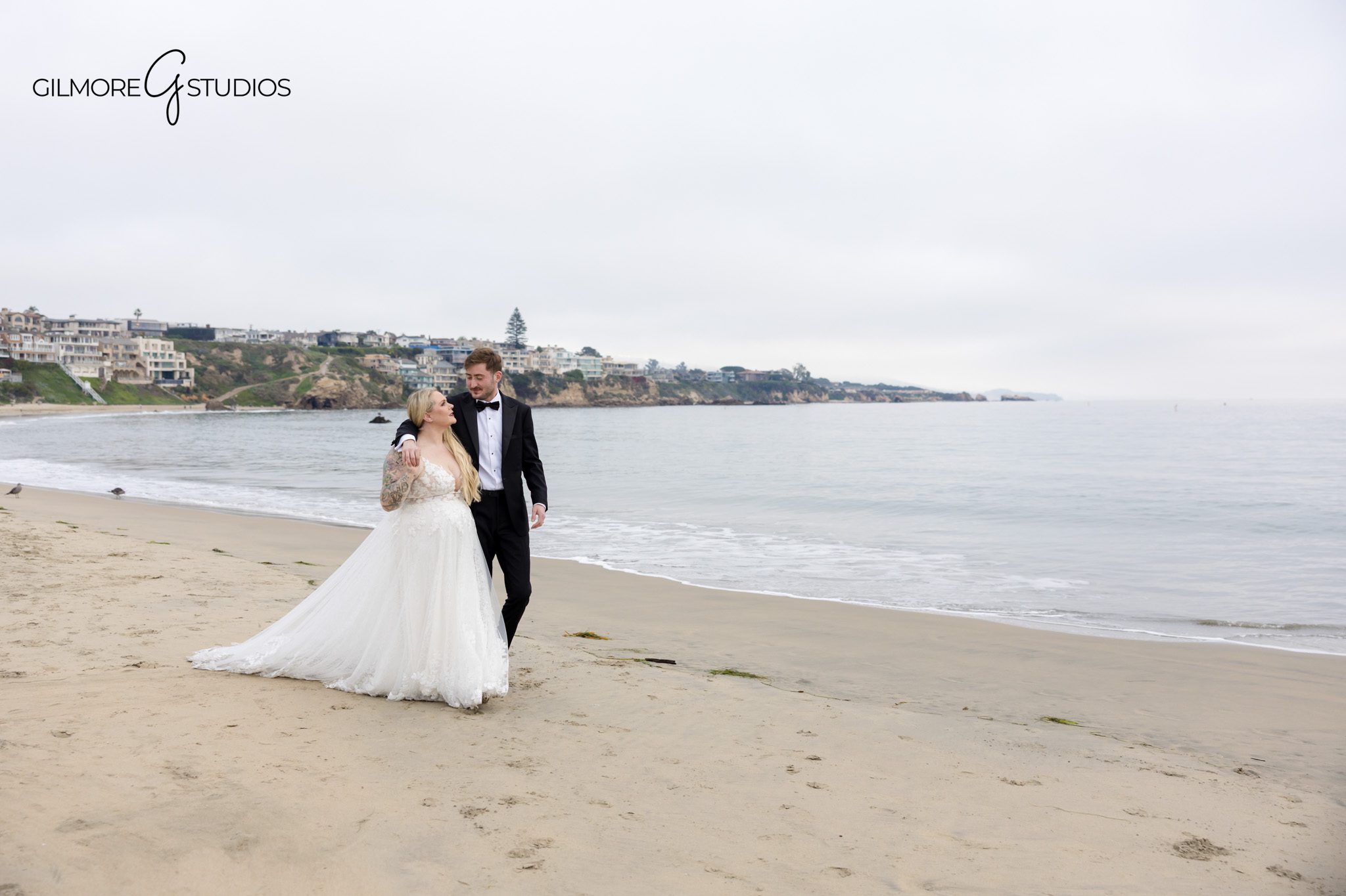 Trash the Dress wedding photography session captured by a professional photographer

Trash the Dress beach portrait photographed in Southern California