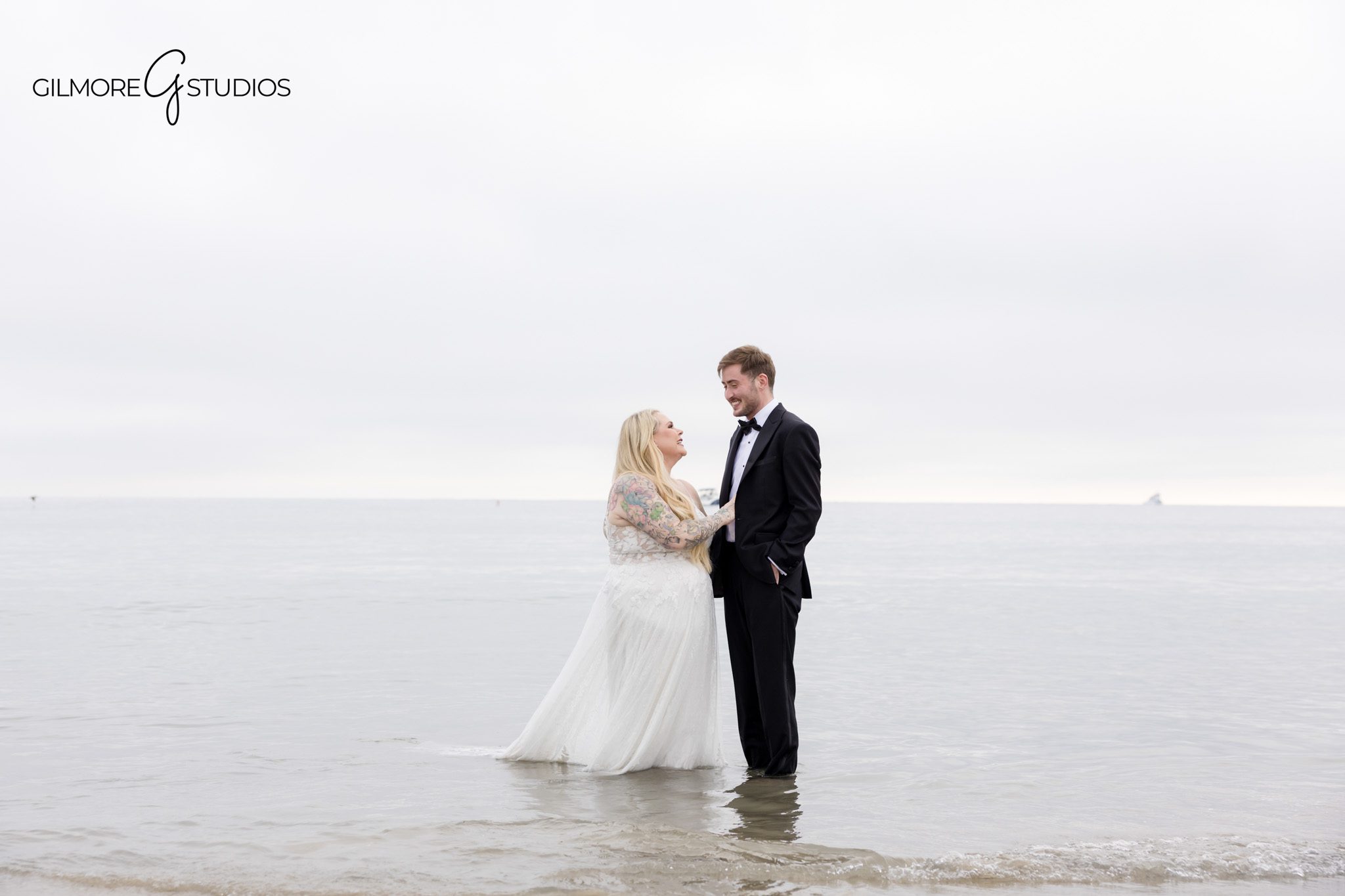 Southern CA Trash the Dress wedding portrait with natural movement and emotion

Trash the Dress photography session featuring a couple at the shoreline