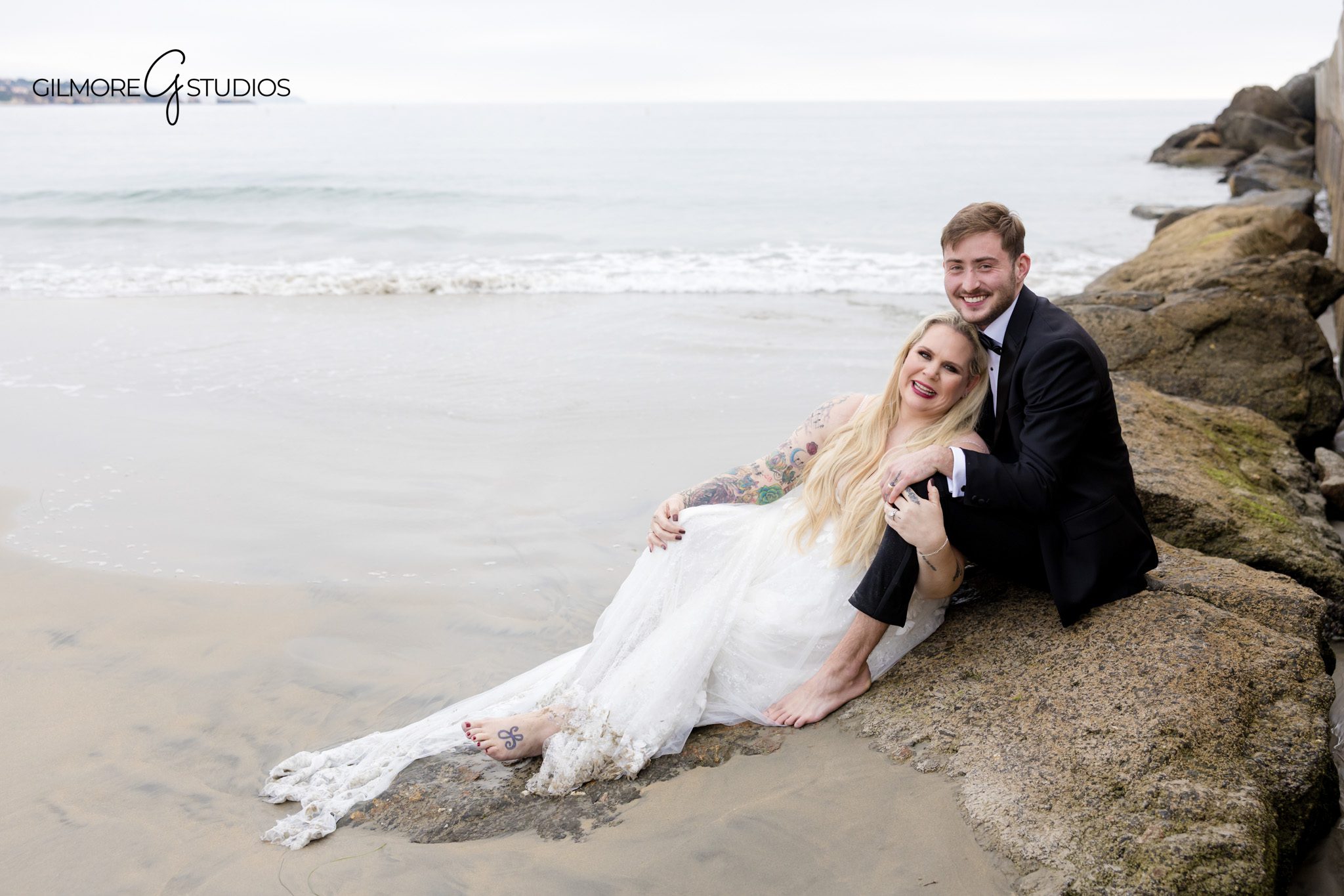 Trash the Dress wedding photography featuring a bride walking into the water

Southern California Trash the Dress portrait with editorial style composition