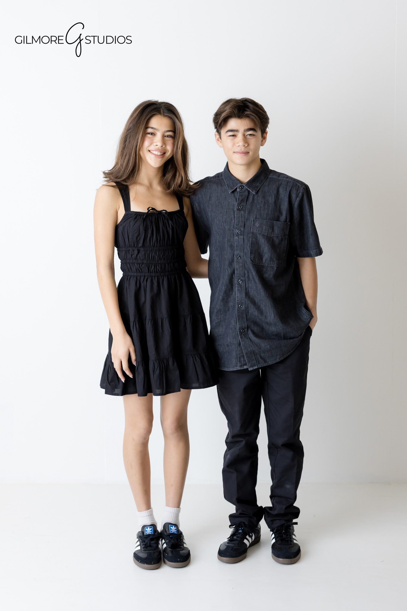 Studio family portrait on white background with natural light

White background family photography session designed for wall art