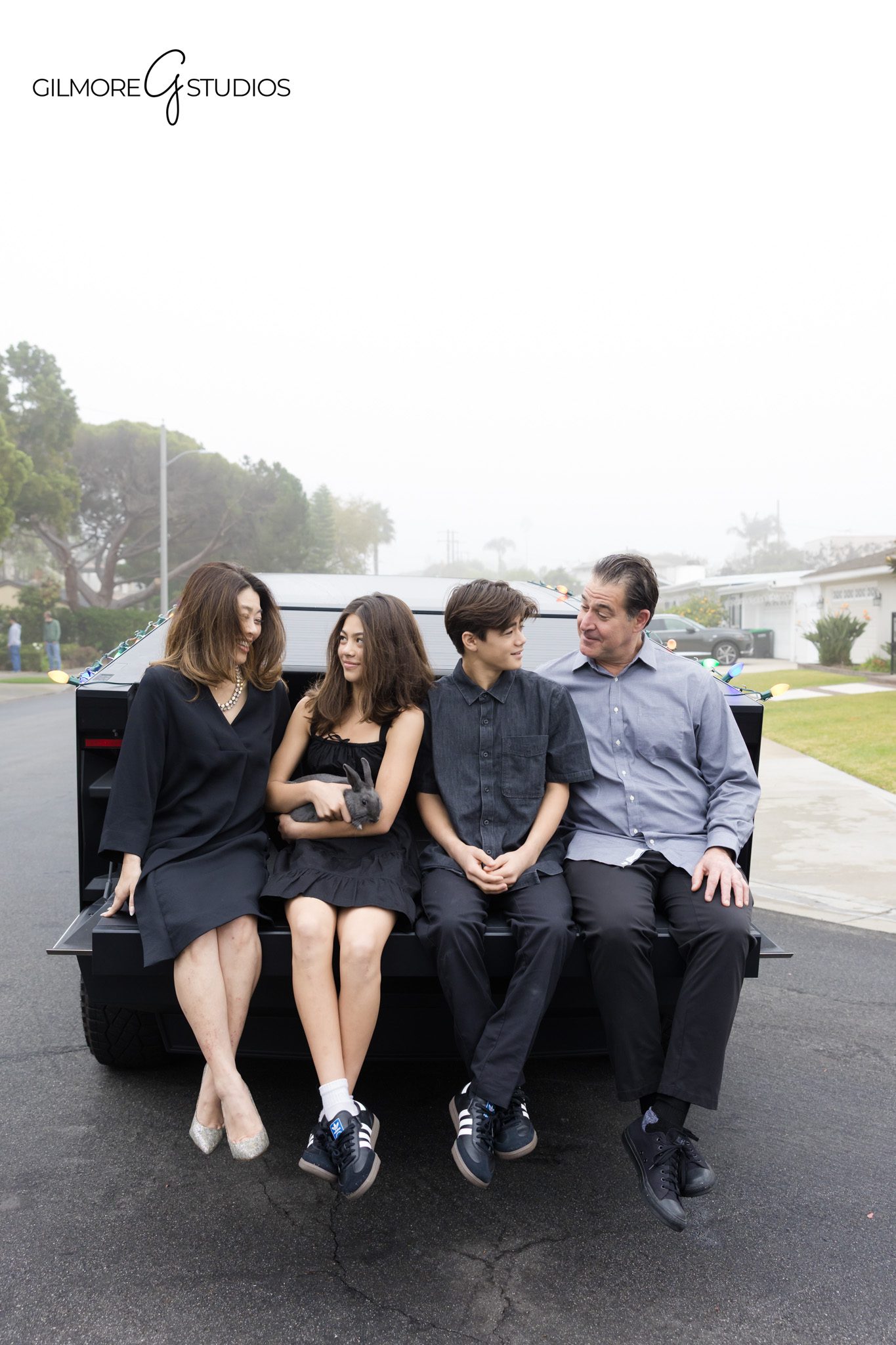 White background family portrait photographed for timeless family memories

Studio family photography session with simple white background