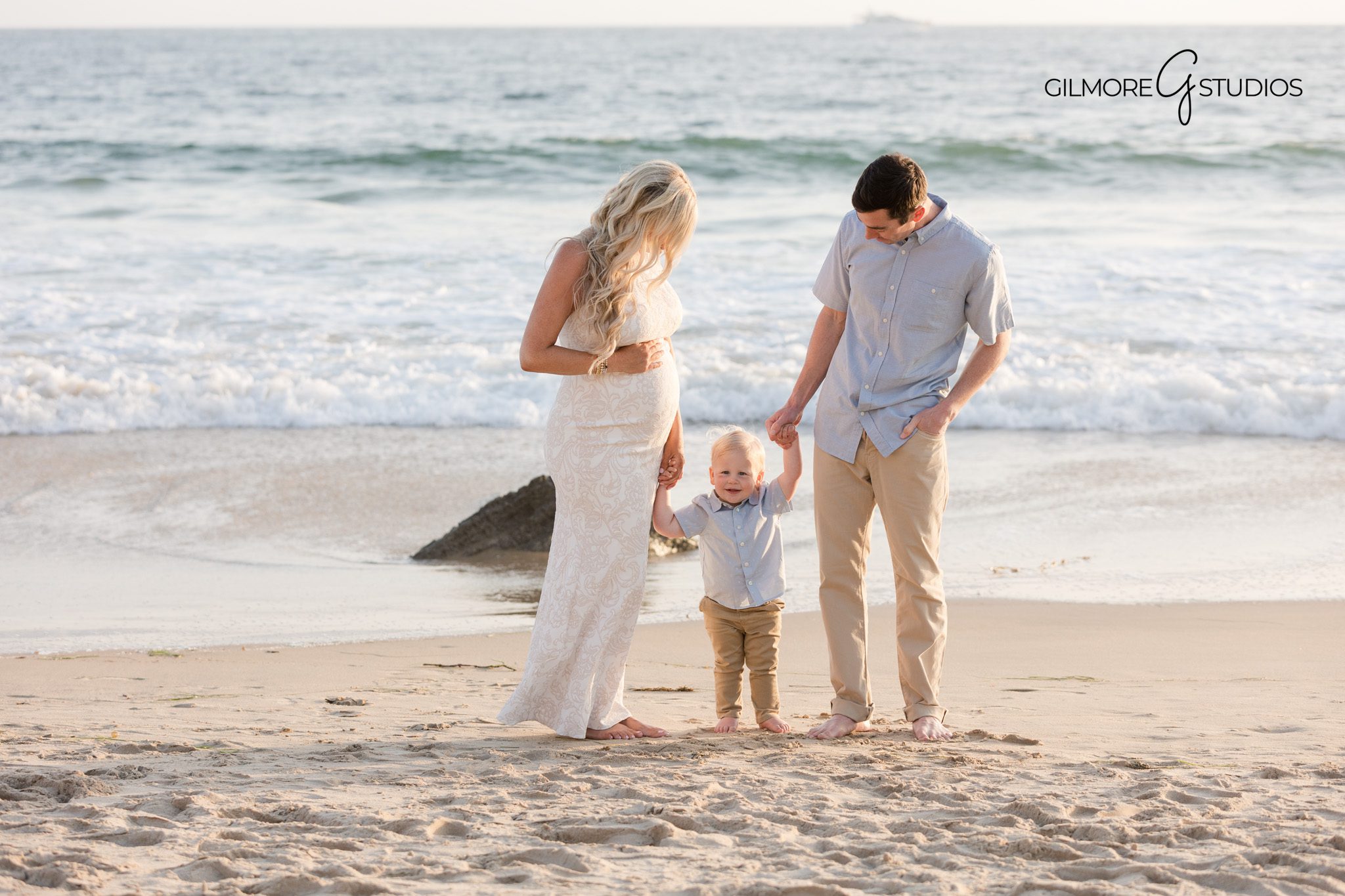 Family maternity session with natural emotion
Partner supporting expecting mother during session