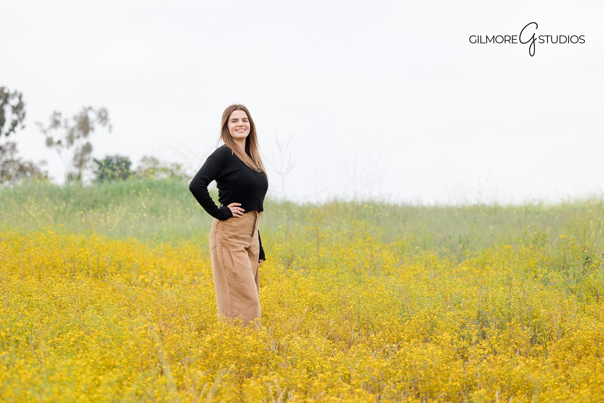 Newport Beach senior portrait photography featuring expressive poses

High school senior photographer capturing a graduation year portrait
