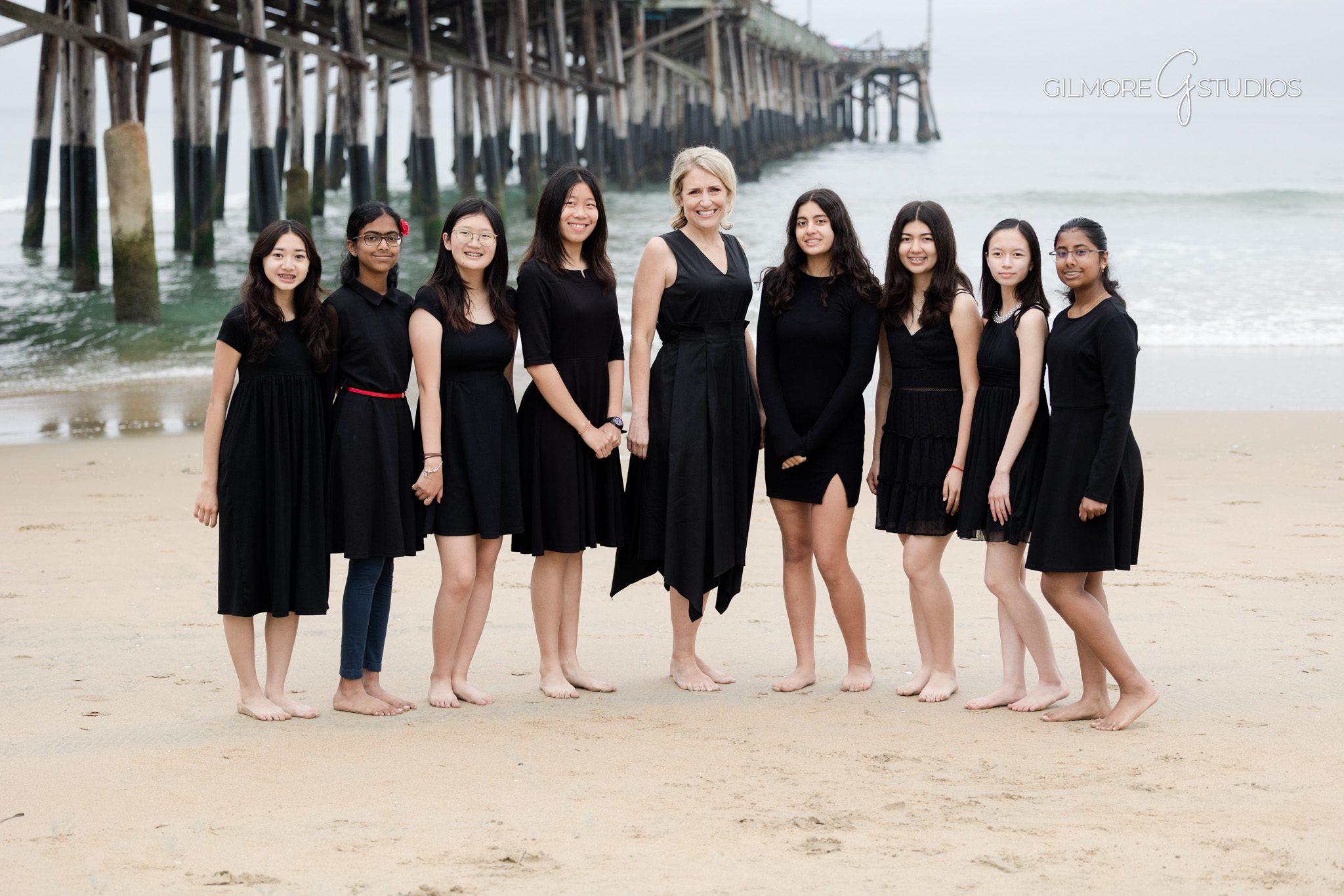 Student professional portraits with Newport Beach Pier scenery

Academic milestone photography session by the coast