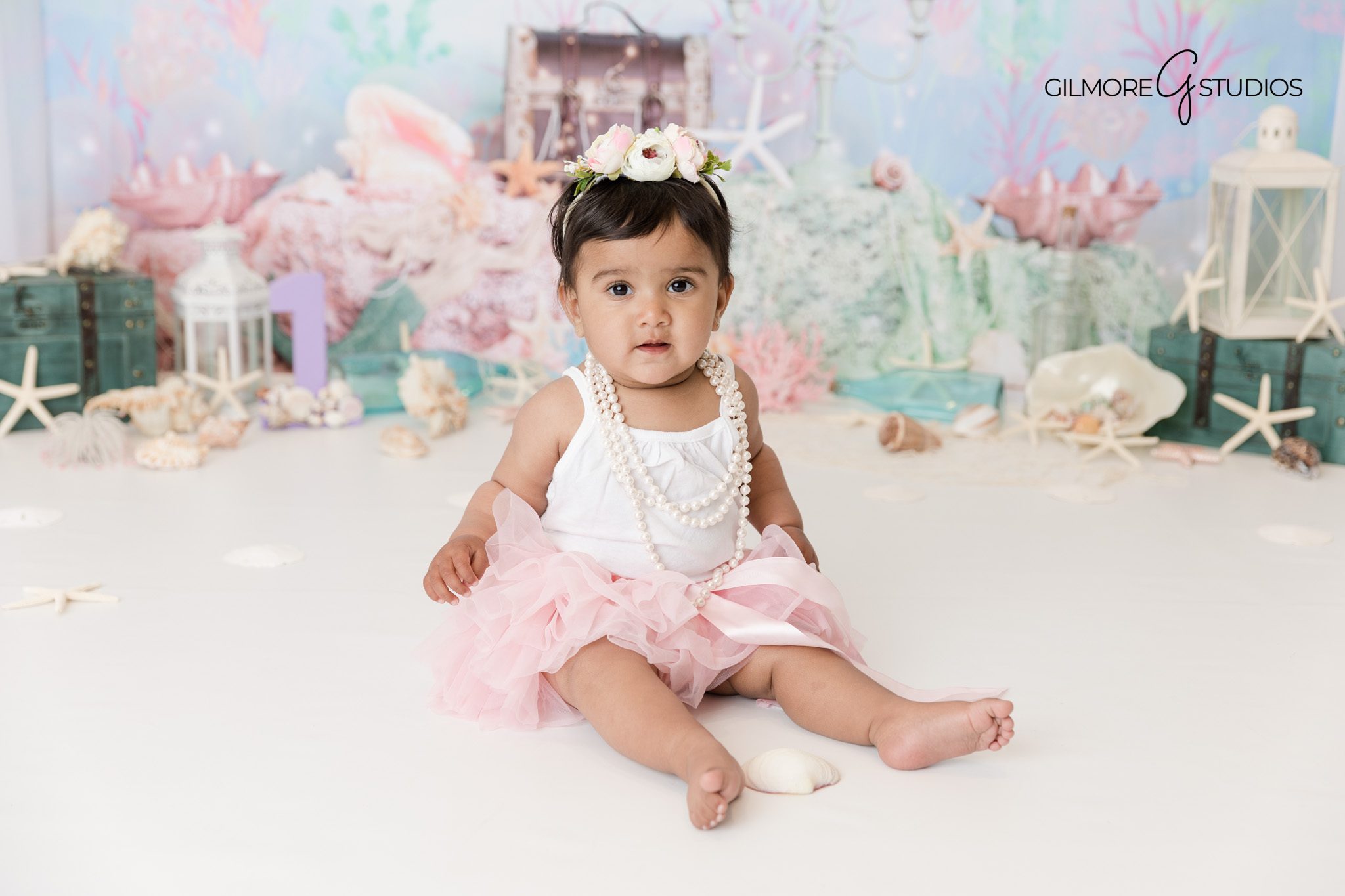 Soft ocean color cake smash portraits Orange County studio

Indoor mermaid themed baby photography session Orange County CA