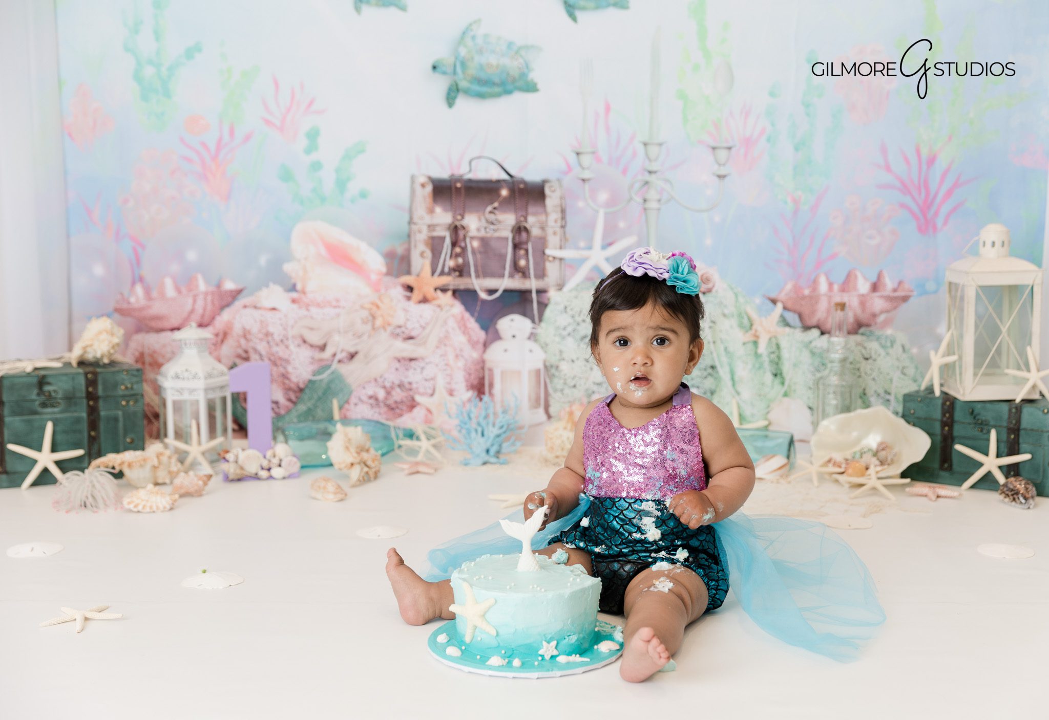 Ocean inspired cake smash photography session in Orange County studio

First birthday baby mermaid themed cake smash portraits Orange County