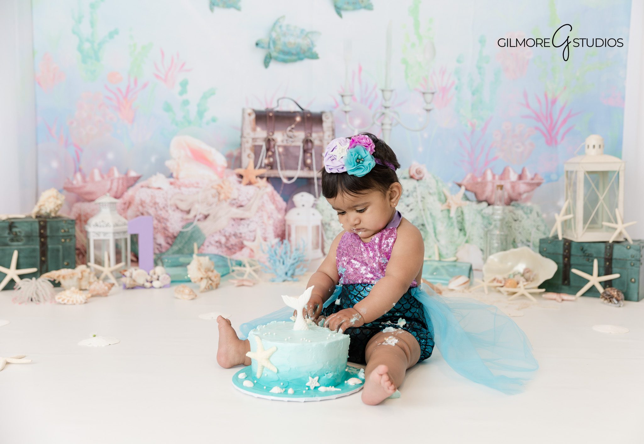 Baby milestone photography mermaid themed cake smash Orange County

Whimsical mermaid cake smash photography setup in Orange County