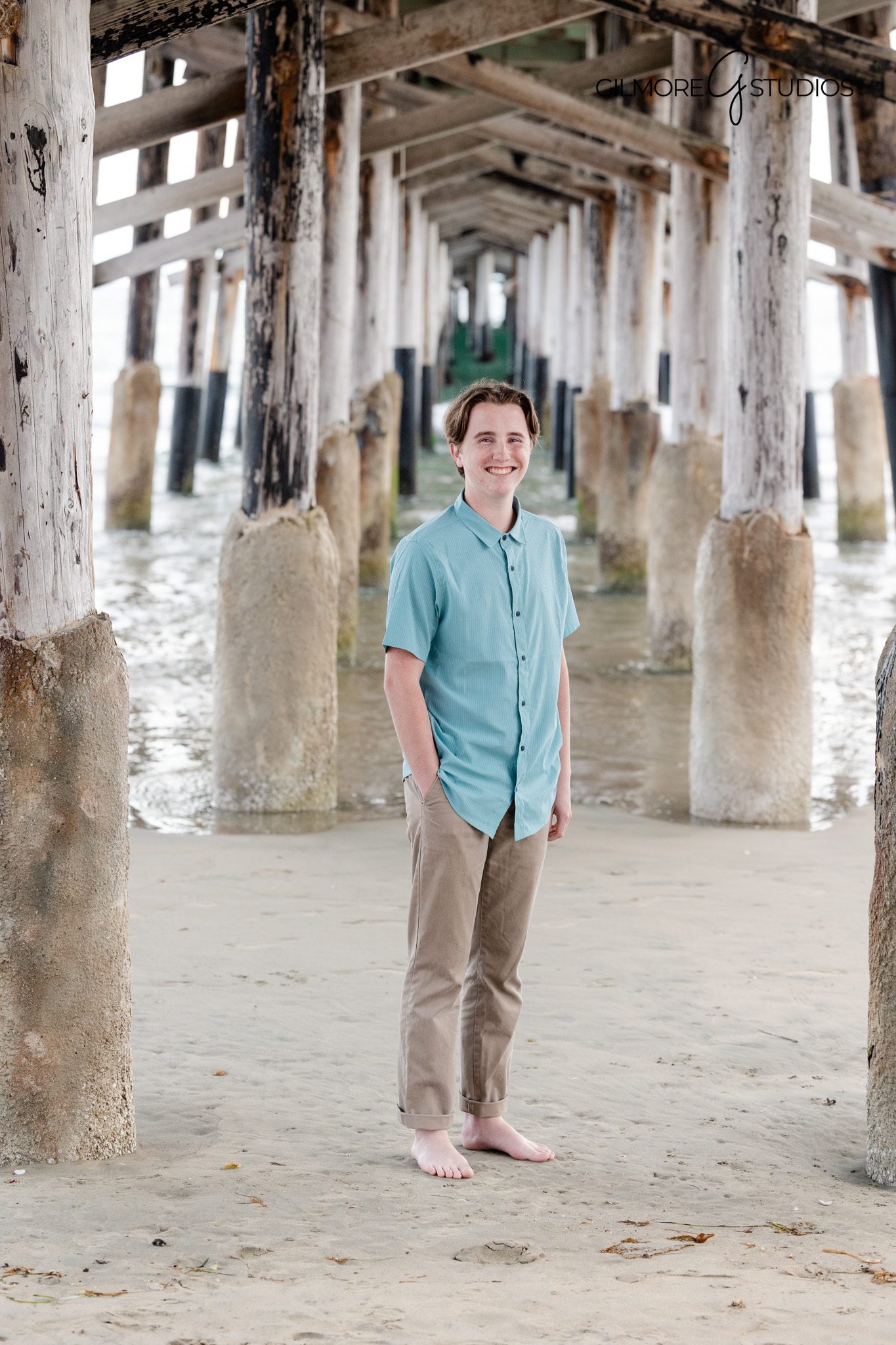 Professional family photographer capturing pier family portraits
Newport Beach Pier family photography with ocean inspired tones