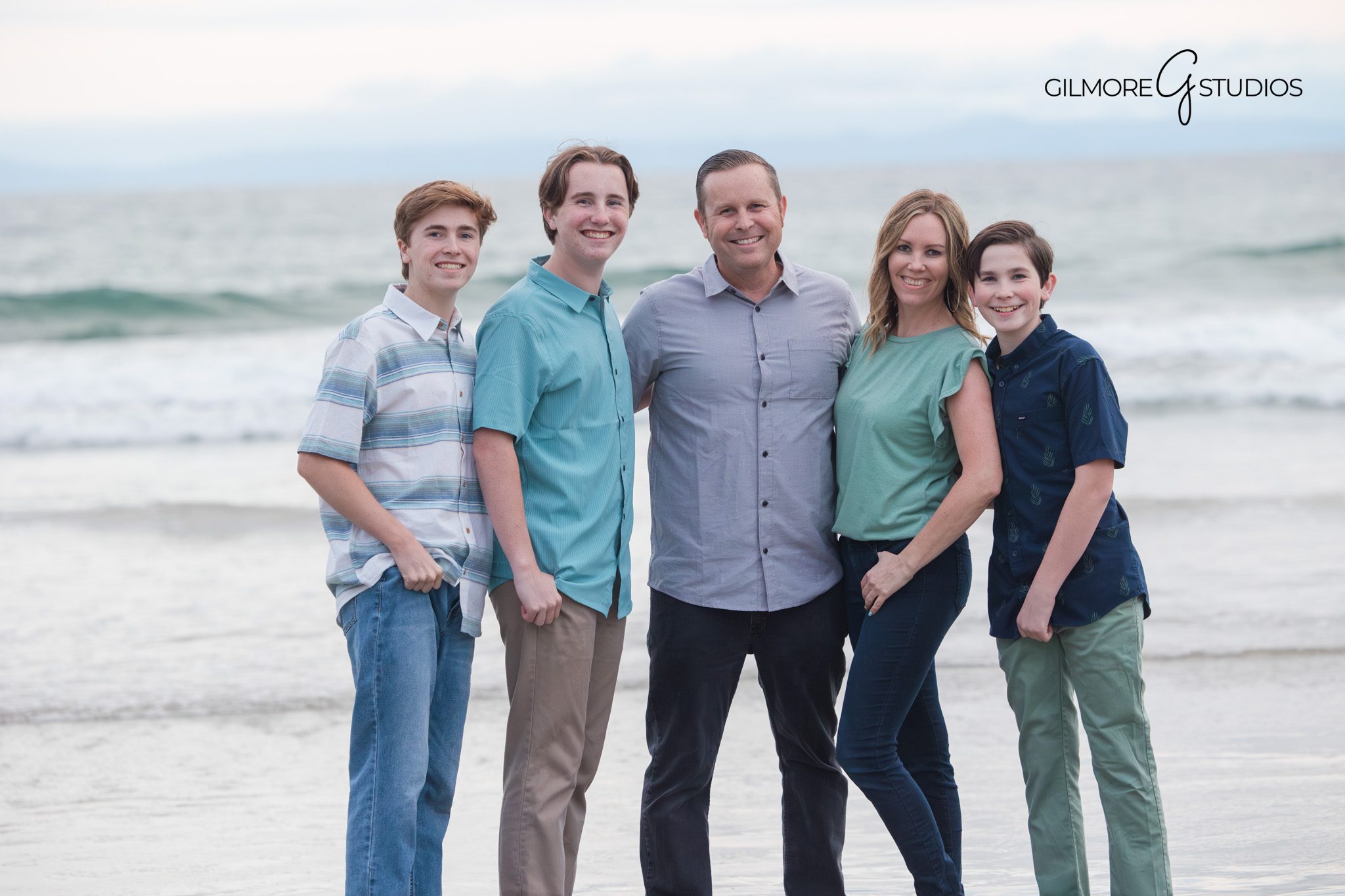 Professional family photographer documenting a Newport Pier session
Coastal family photography captured at Newport Beach Pier
