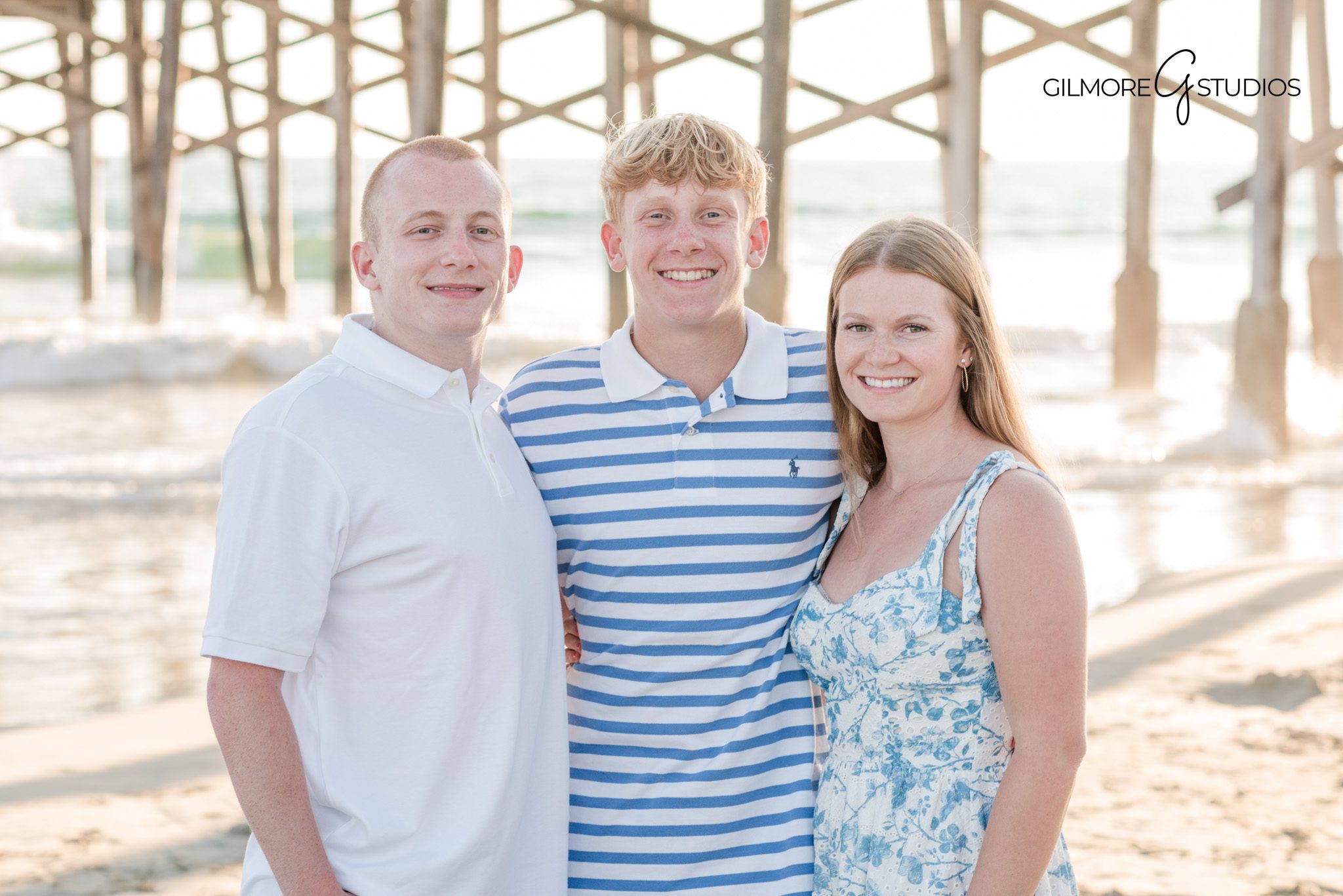 Professional family photography session at a Newport Beach pier
Newport Pier family portrait photography featuring playful moments