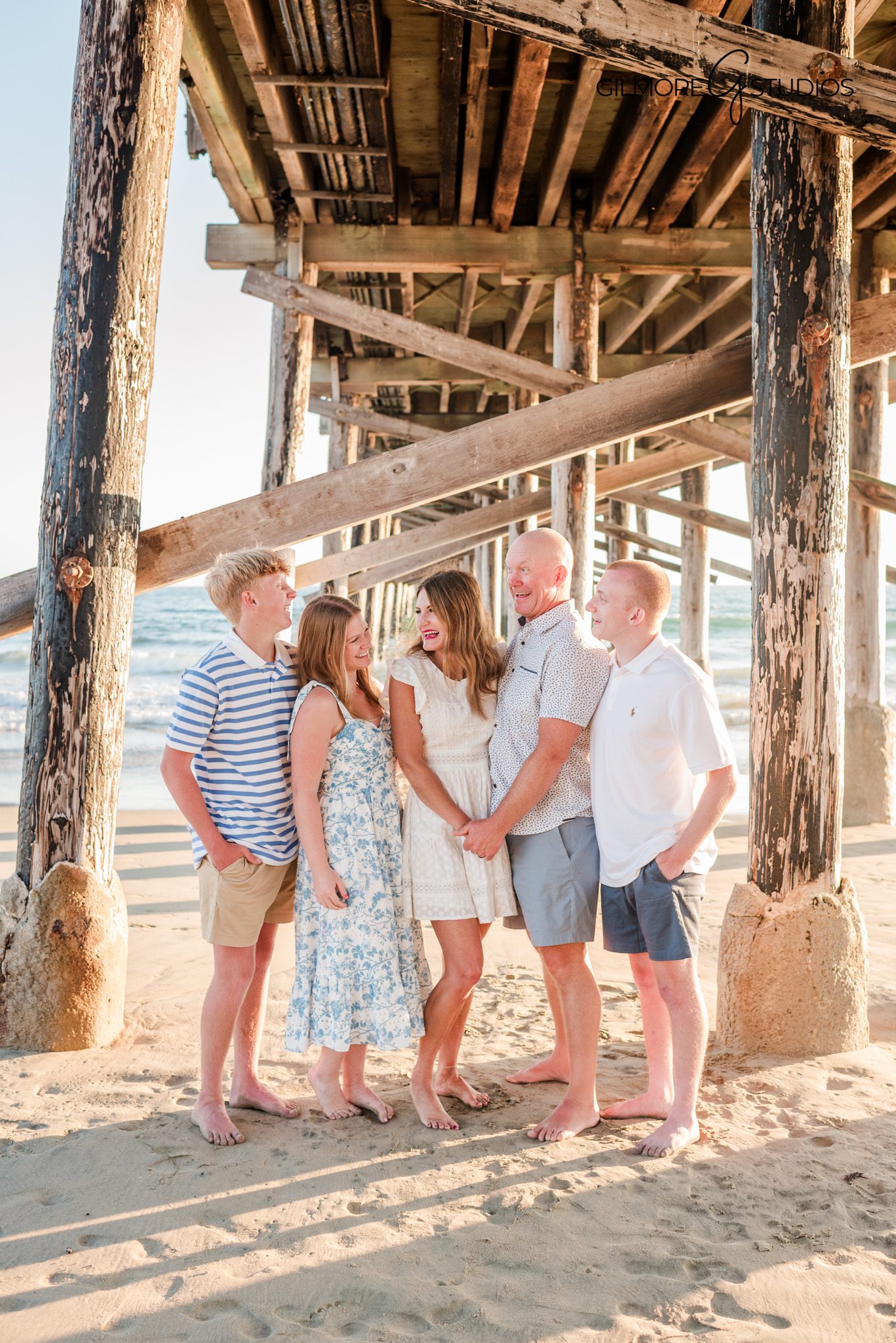 Newport Beach family photos capturing parents and kids together at the pier
Family photography session designed to feel natural and relaxed