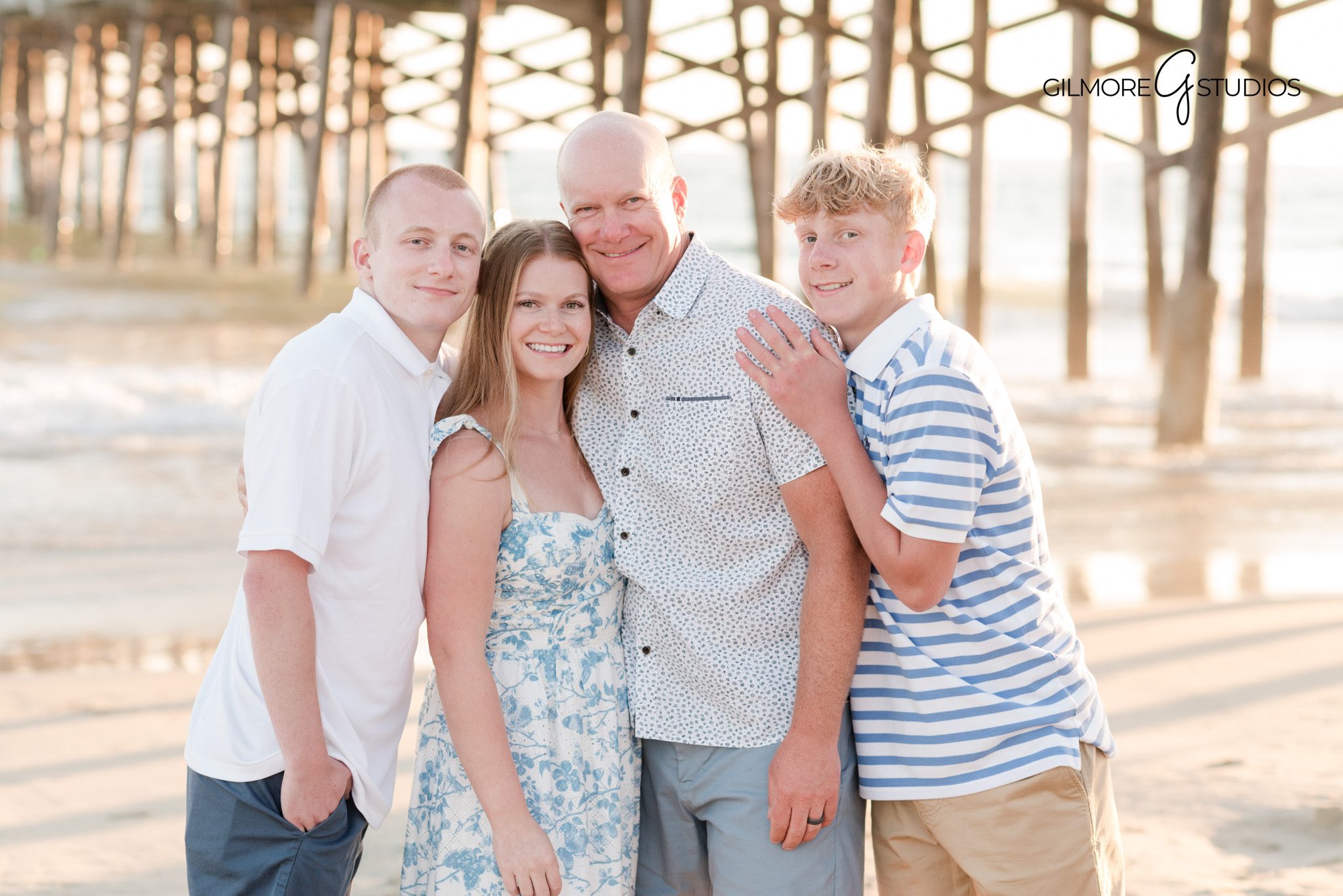 Newport Pier family photos showcasing relaxed family interaction
Professional family photography session at Newport Beach Pier
